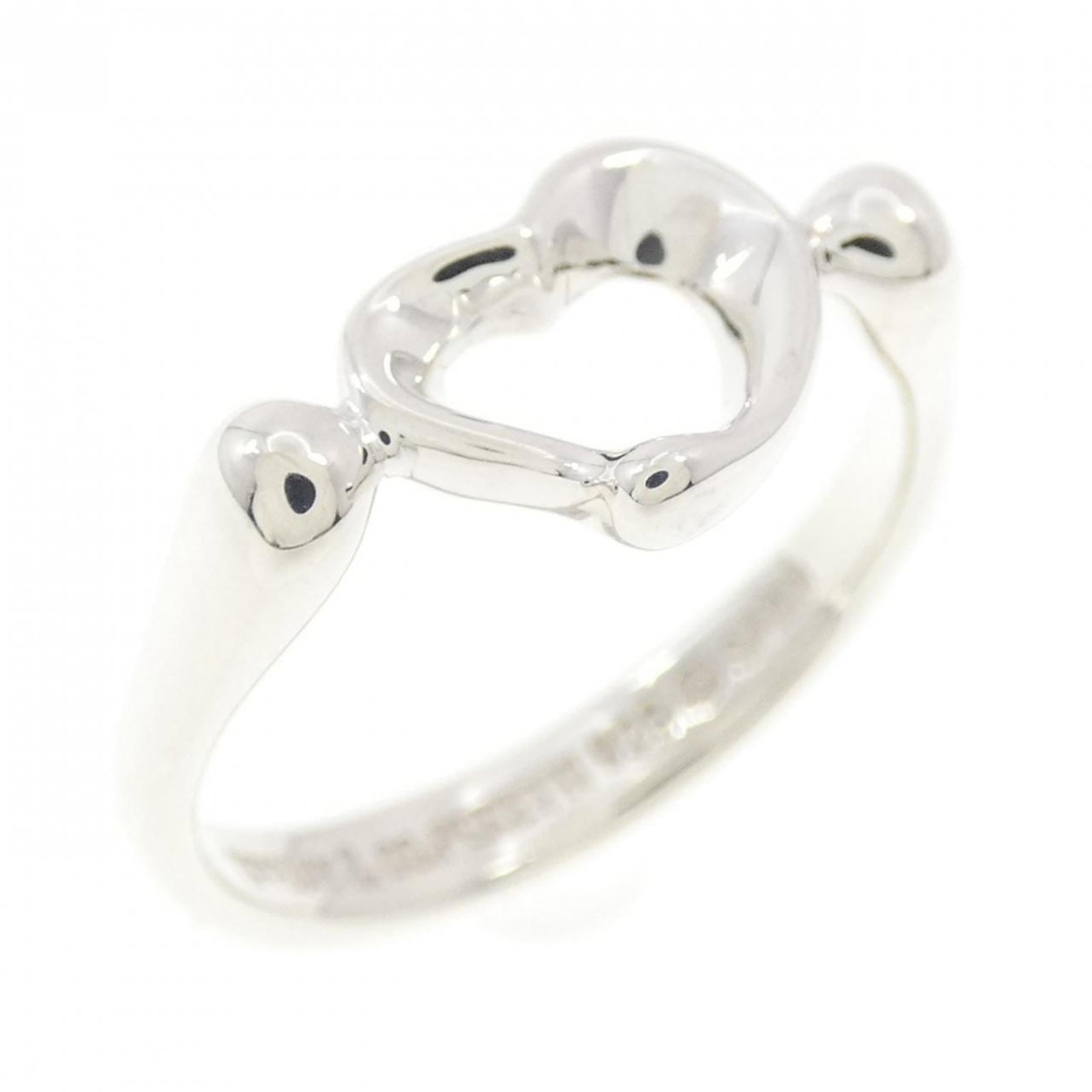 Silver 925 Tiffany Band Ring: Silver 925 Tiffany Band Ring Silver 925 Tiffany Band Ring features a classic open heart design, crafted from high-quality silver material. This elegant ring boasts a timeless style and weighs