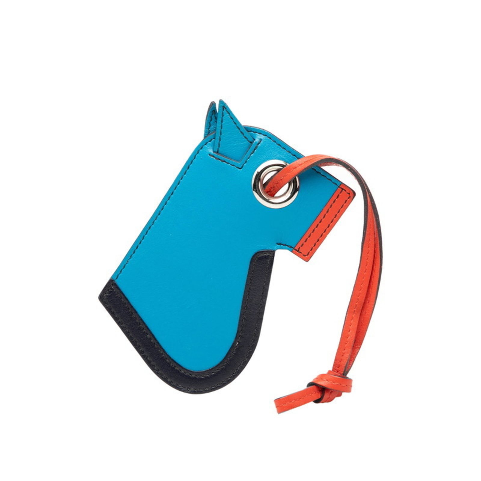 Tadelakt leather handbag charm from Hermes: Tadelakt leather handbag charm from Hermes Tadelakt leather, a distinctive and luxurious material, adorns this charming handbag charm from Hermes. Measuring 115mm x 75mm, the blue and orange hues add