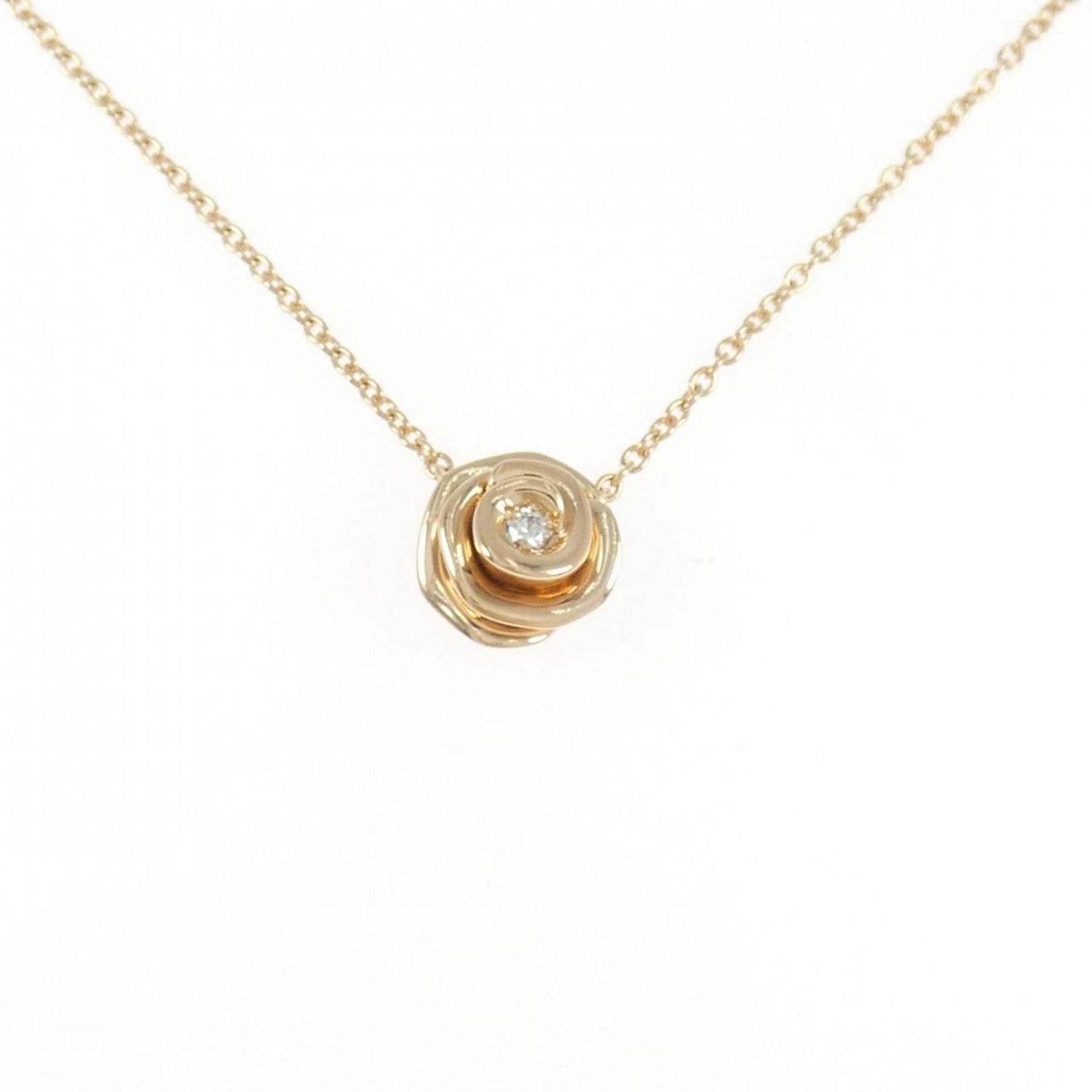 Christian Dior Rose Couture Necklace: Christian Dior Rose Couture Necklace Pink gold (18K) pendant featuring a diamond, suspended from a necklace with a circumference adjustable to fit 38 cm - 43 cm. The pendant measures 9.8mm x 9.7mm and