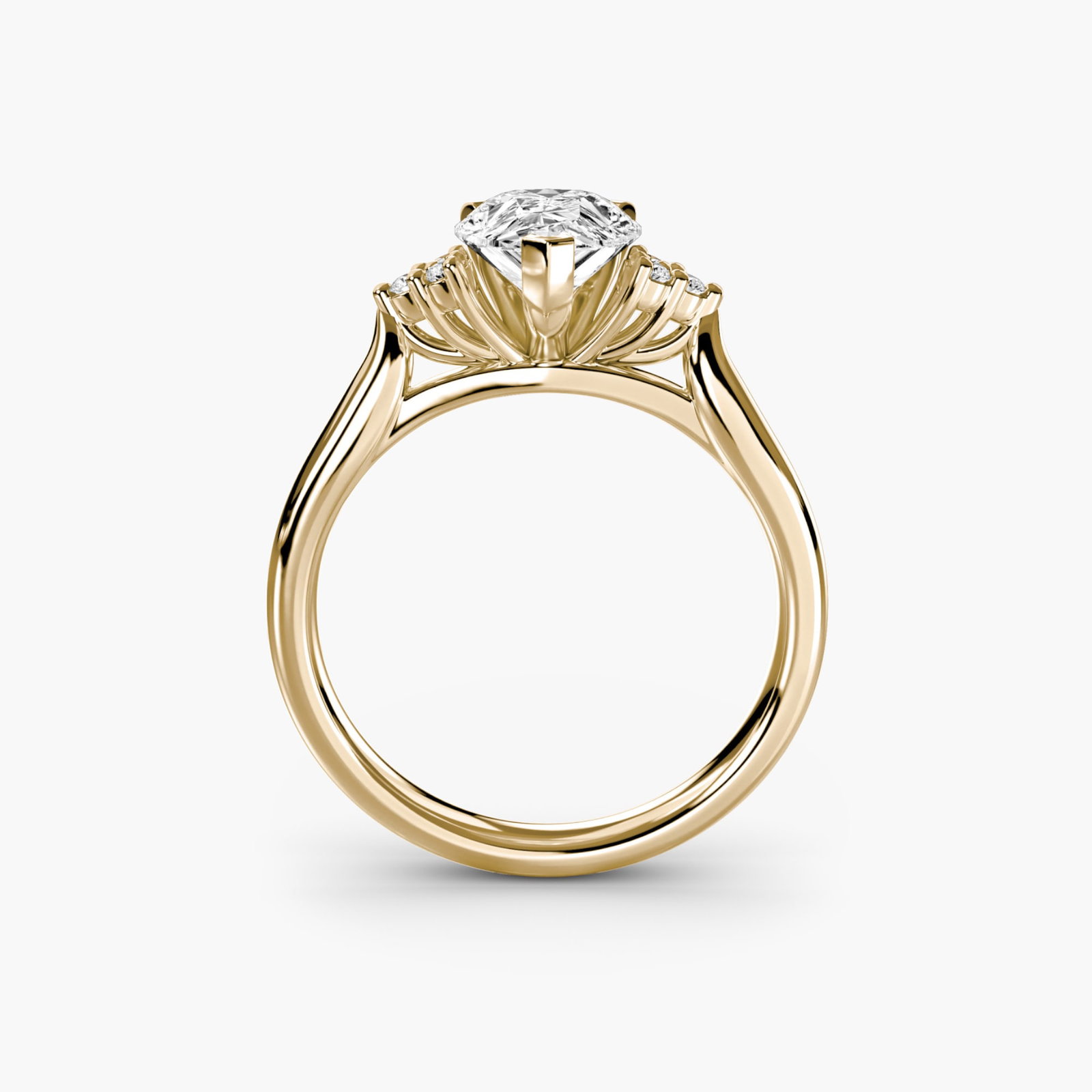 Solitaire Pear 18Kt Yellow Gold Ring Setting: Solitaire Pear 18Kt Yellow Gold Ring Setting 18Kt Yellow Gold Solitaire Pear Ring Setting. This elegant ring setting features six lab-grown side stones totaling 0.08 carats, set in a sturdy 4.17ct 18k