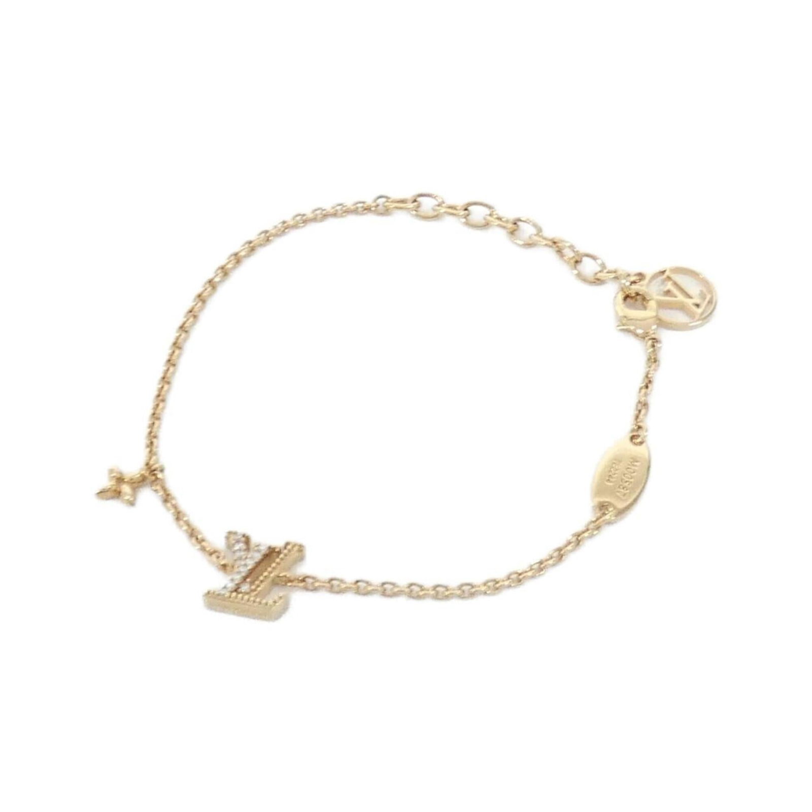 Louis Vuitton Charm Bracelet: Louis Vuitton Charm Bracelet Gold charm bracelet from Louis Vuitton, available in lengths of 15.5cm to 19cm. This style features the iconic M00587 model, adding a touch of luxury to any outfit. Item
