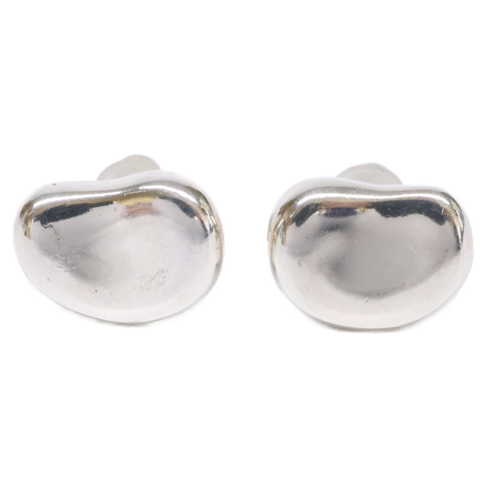 Tiffany Stud Earrings Silver 925: Tiffany Stud Earrings Silver 925 Stud earrings in silver 925, bearing the Tiffany brand. Made from high-quality sterling silver, these elegant earrings feature a sleek design with precise dimensions