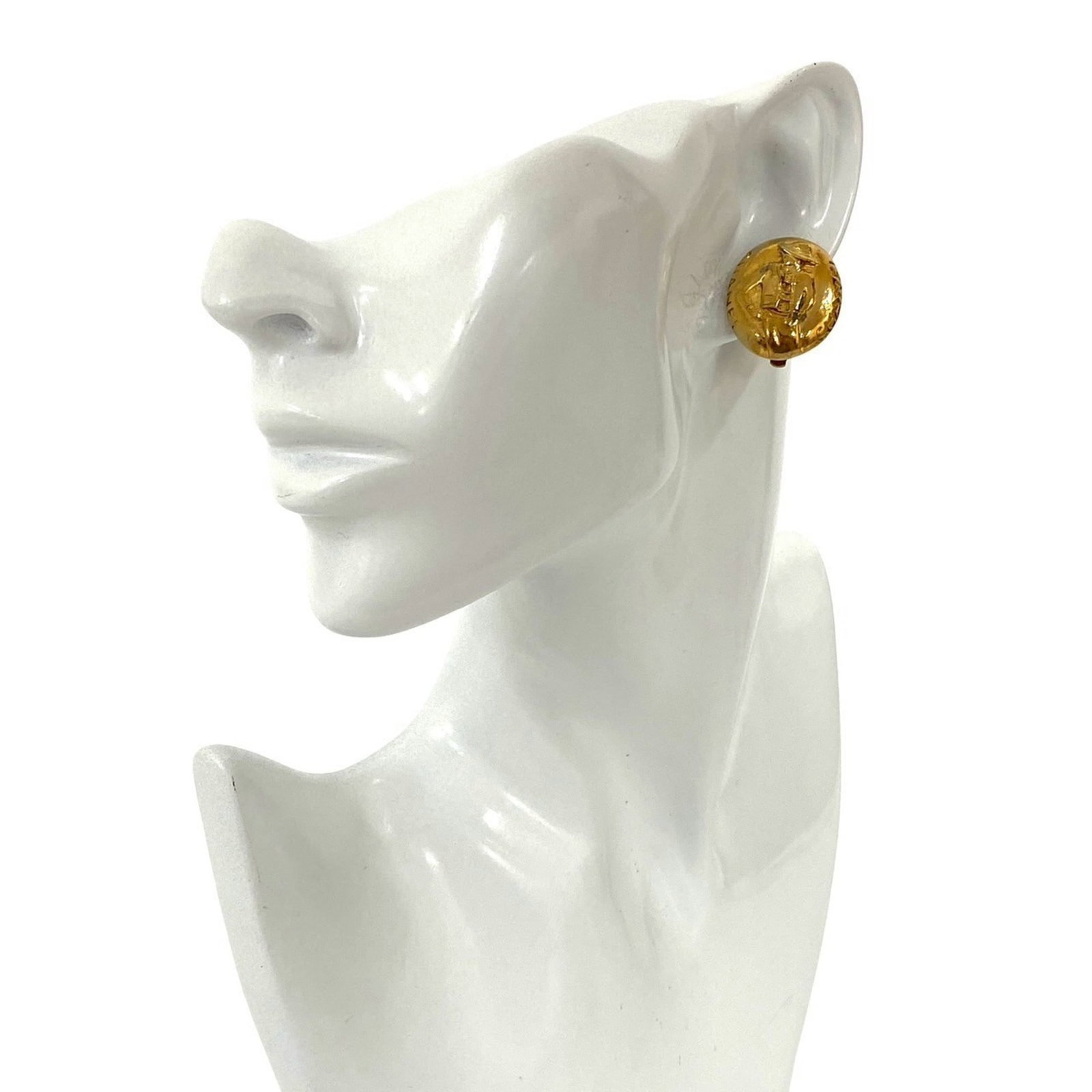 Chanel Clip Earrings Gold Plating: Chanel Clip Earrings Gold Plating Gold plating gives these Chanel clip earrings a luxurious touch, while their compact size makes them easy to wear. Measuring 25mm x 20mm, they are designed for a
