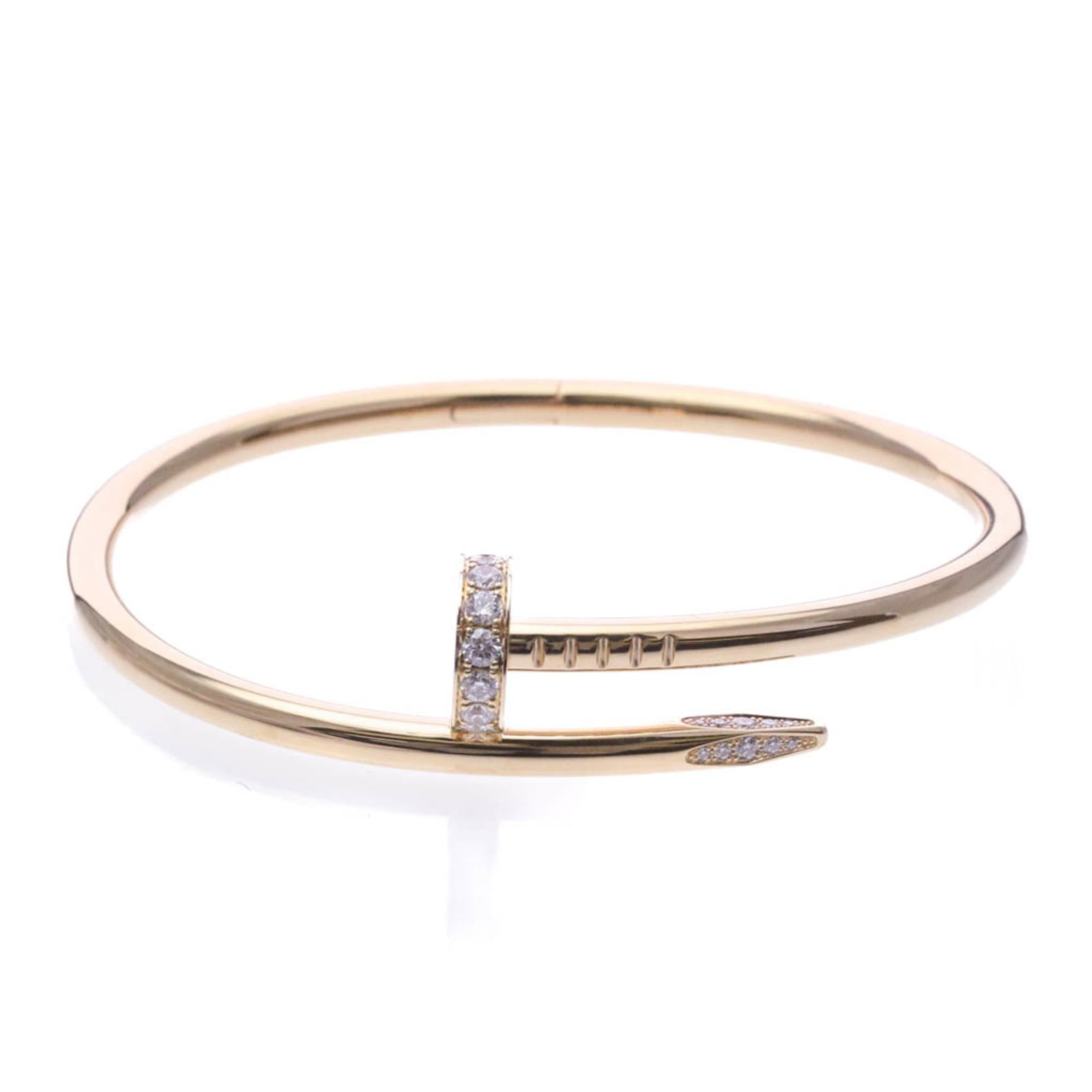 Pink Gold Bangle Cartier: Pink Gold Bangle Cartier Pink gold (18K) bangle with diamonds from Cartier's Juste un Clou collection, featuring a signature and weighing 29.5g / 1.04oz. This stylish piece is crafted from 18K pink go
