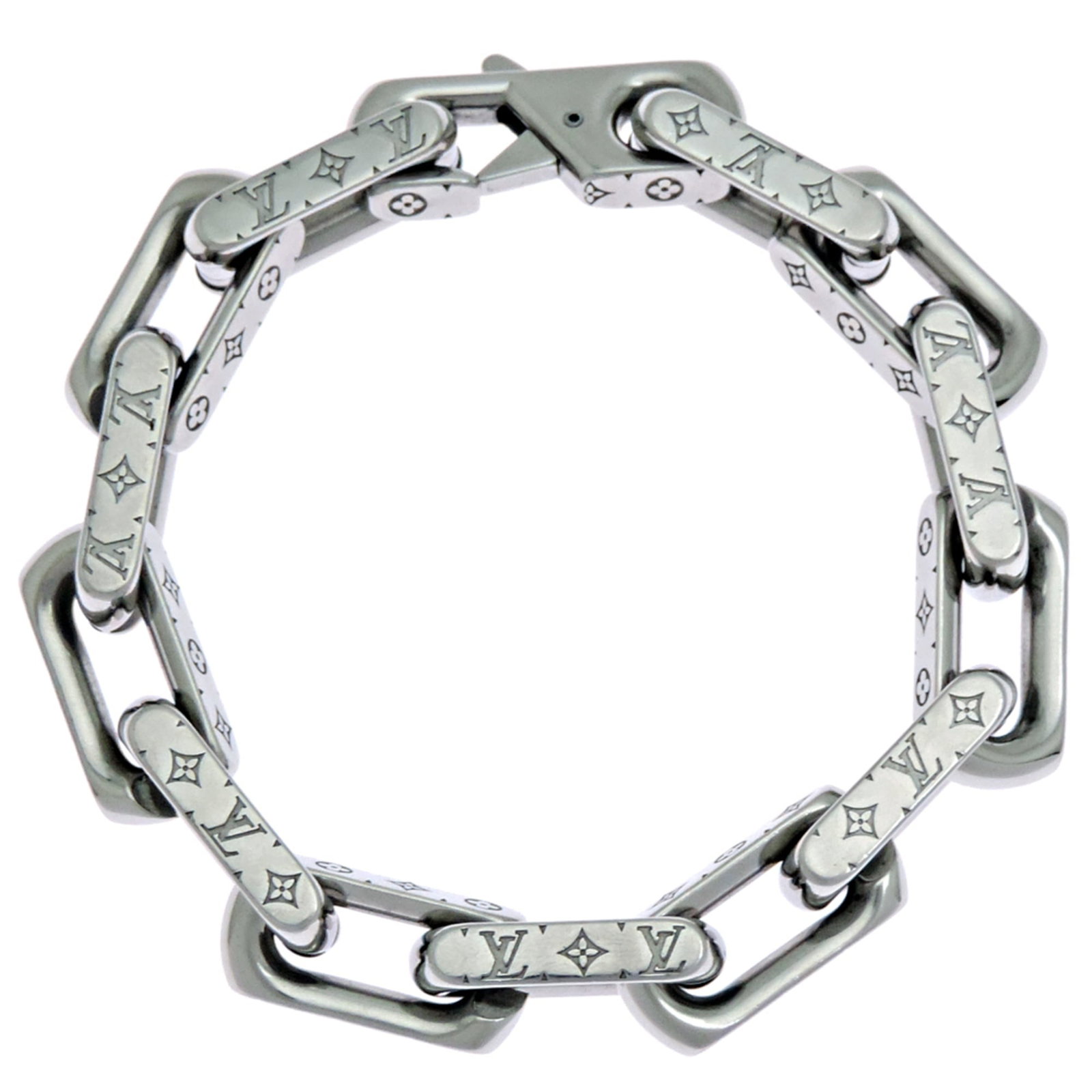 Metal Charm Louis Vuitton: Metal Charm Louis Vuitton Metal Charm Louis Vuitton bears the signature of its creator. Made from metal, this charm bracelet measures 19cm in length and features a notable design element. The Italian