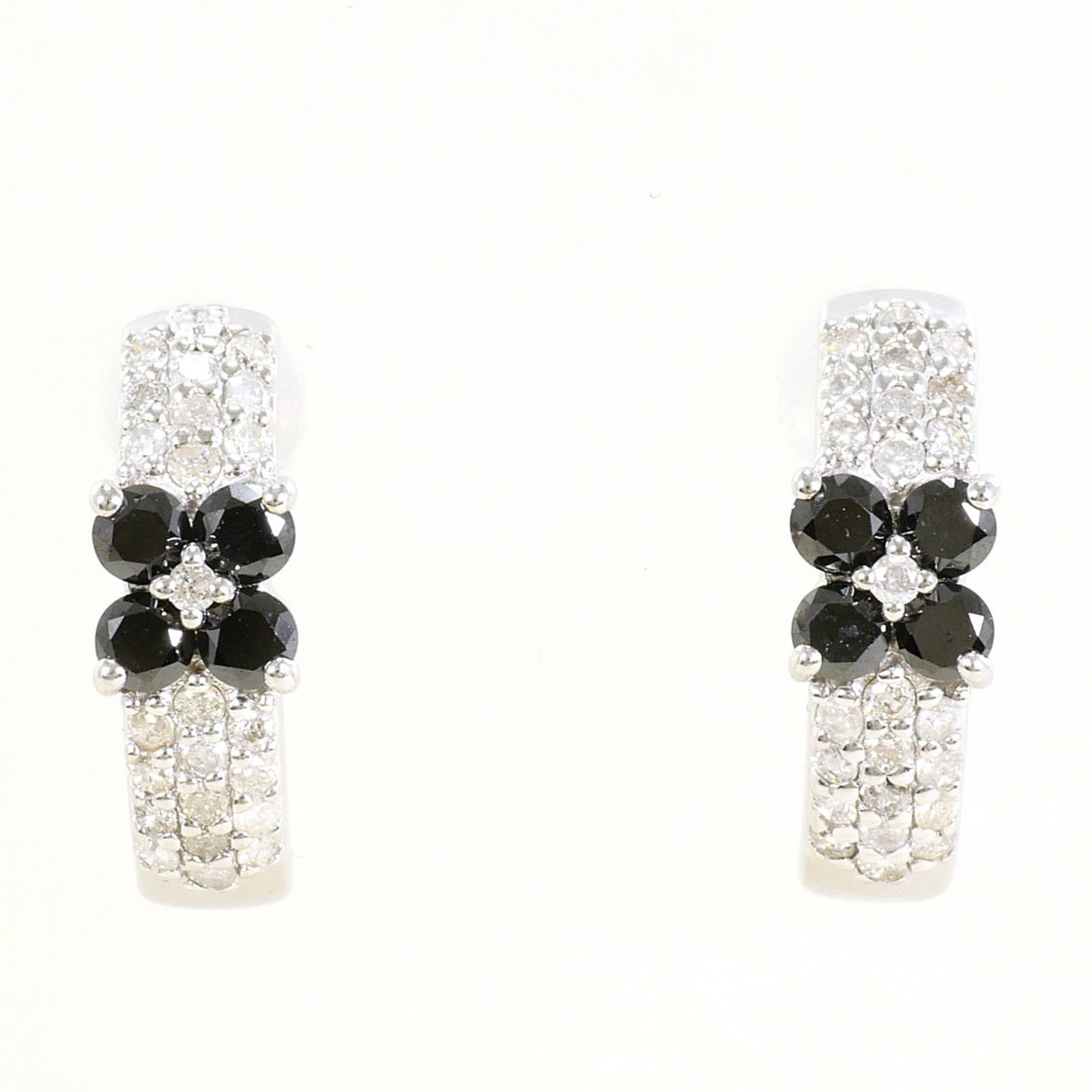 Unbranded Stud Earrings White Gold (14K): Unbranded Stud Earrings White Gold (14K) Stud earrings made from unbranded 14K white gold, featuring a black stone and weighing approximately 2g. The metal purity is 14K, providing a high level of