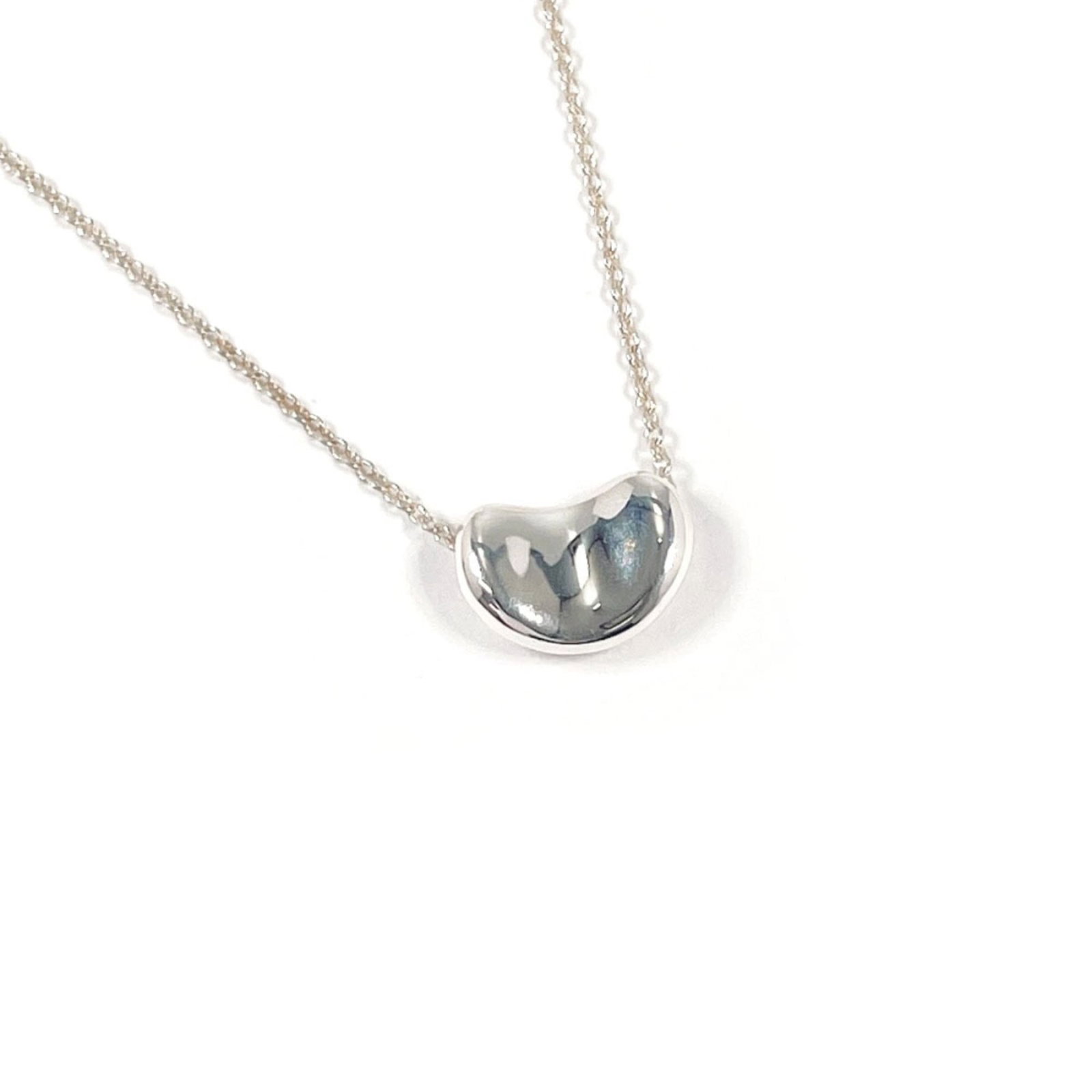 Silver Elsa Peretti Necklace Women's Sterling Silver 925 Tiffany & Co.: Silver Elsa Peretti Necklace Women's Sterling Silver 925 Tiffany & Co. Silver Elsa Peretti Necklace Women's Sterling Silver 925 Tiffany & Co. features a 7.7mm x 11.1mm silver pendant, measuring 42 cm