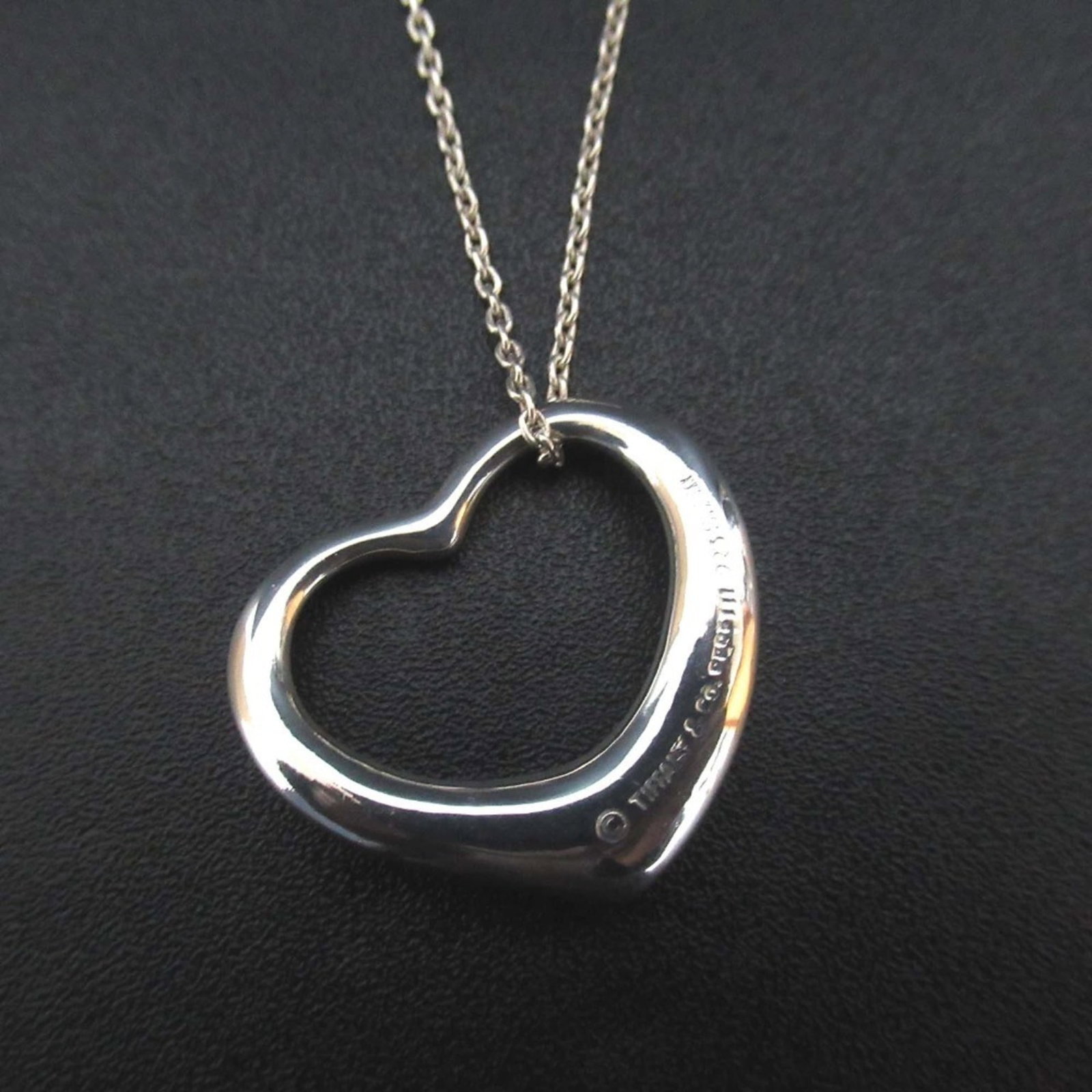 Tiffany & Co. Elsa Peretti Open Heart Large Necklace Pendant In 925 Sv Silver For Women: Tiffany & Co. Elsa Peretti Open Heart Large Necklace Pendant In 925 Sv Silver For Women Tiffany & Co.'s Elsa Peretti Open Heart Large Necklace Pendant is crafted from high-quality 925 sterling silver,