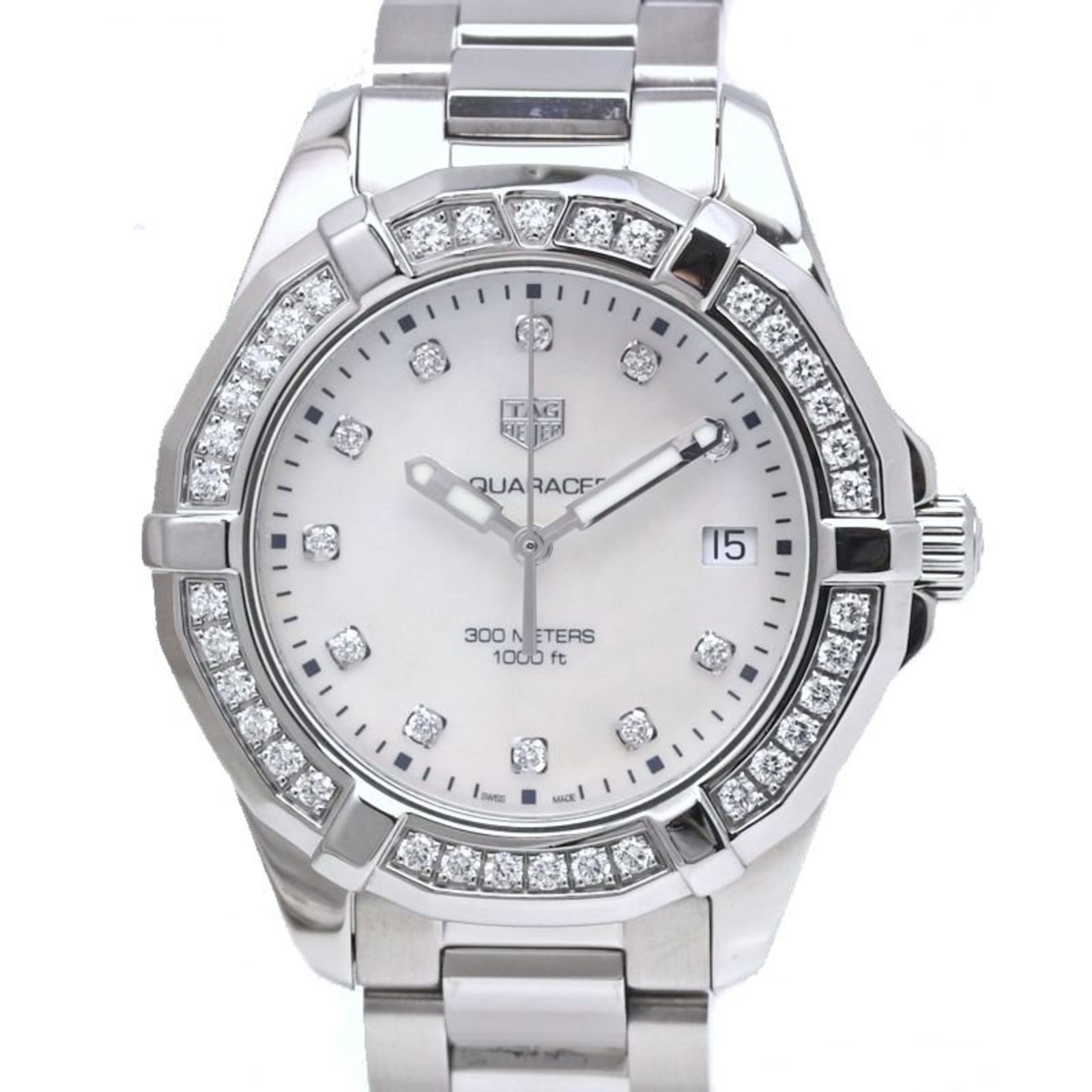 Wristwatch From Tag: Wristwatch From Tag Stainless steel case and band, paired with a white shell dial, make for a sleek and modern timepiece. The quartz movement ensures accurate timekeeping, while the 36mm diameter and 