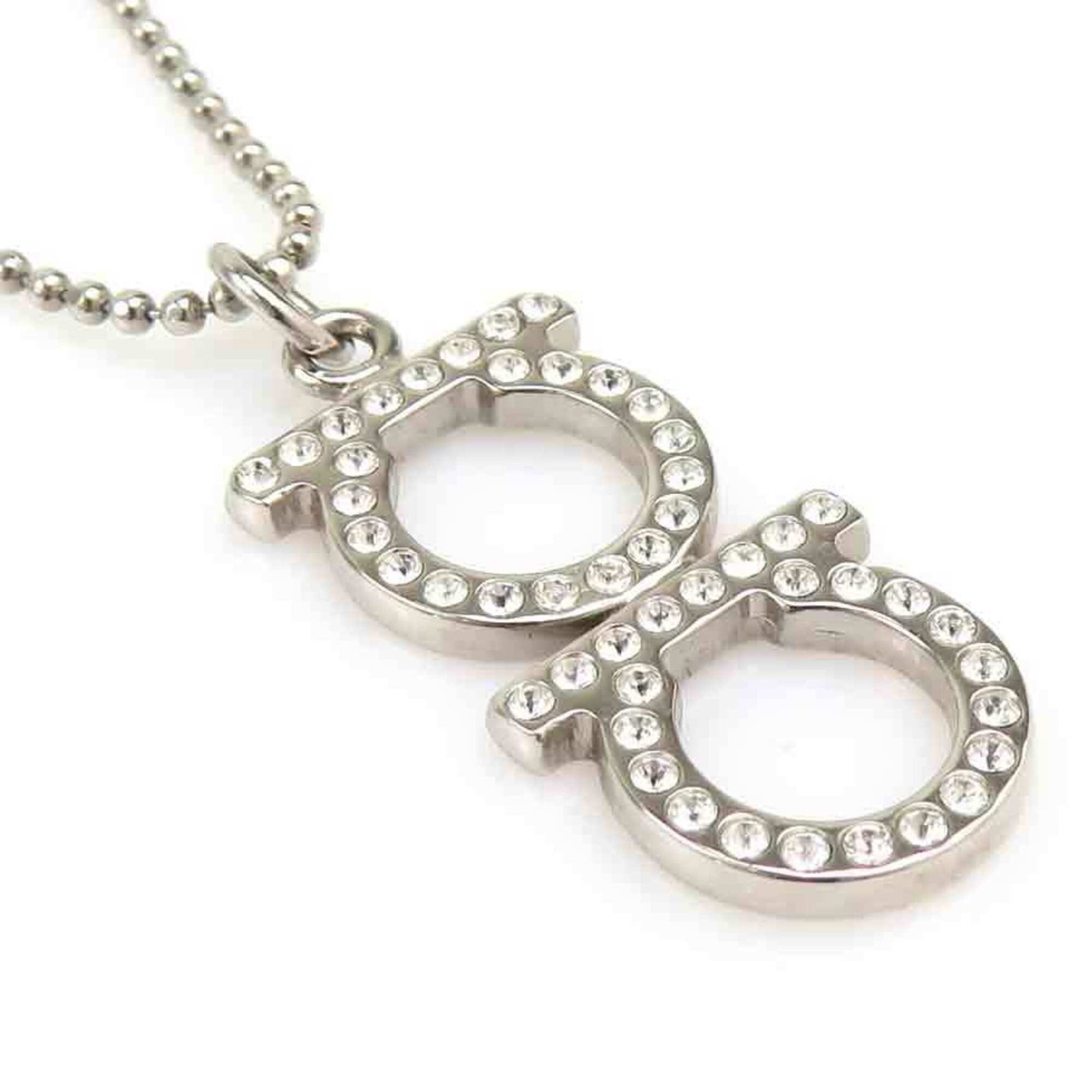 Metal Rhinestones Silver Women's Necklace Salvatore Ferragamo H32181B: Metal Rhinestones Silver Women's Necklace Salvatore Ferragamo H32181B Silver Metal Rhinestones Salvatore Ferragamo Necklace, featuring a 27mm x 15mm silver metal pendant adorned with rhinestones. This