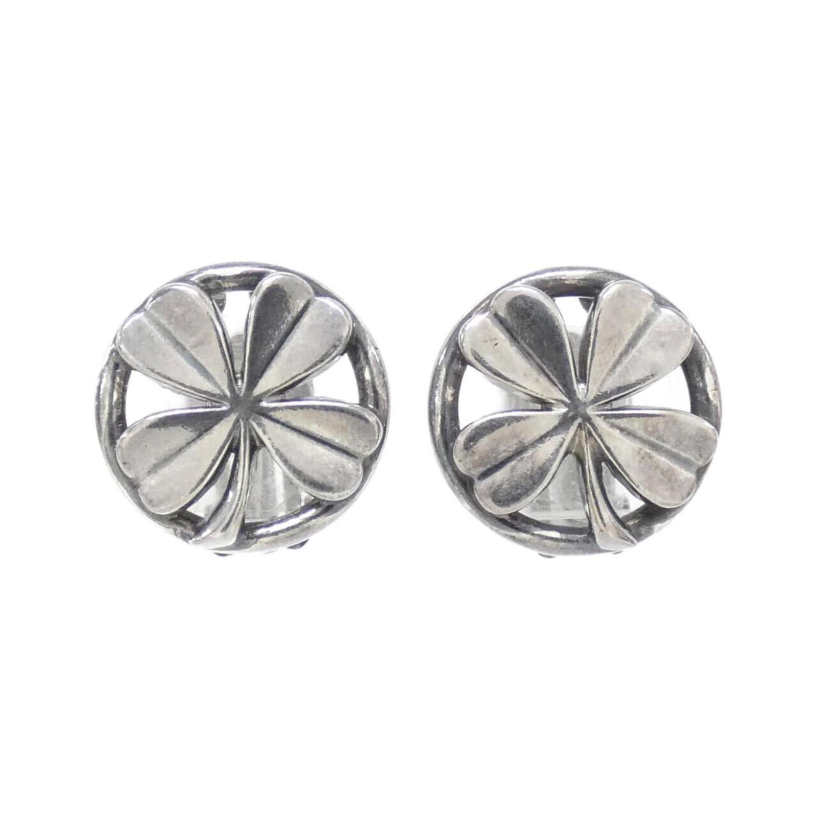 Clip earrings by Chanel: Clip earrings by Chanel Clip earrings by Chanel feature a sleek silver design with precise dimensions, measuring 21.00mm x 21.00mm / 0.83'' x 0.83''. The compact size and minimalist aesthetic make