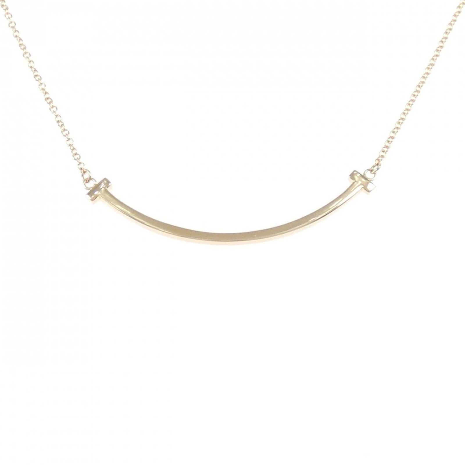 Smile Small Tiffany T Necklace: Smile Small Tiffany T Necklace Pink gold (18K) necklace with a small Tiffany T pendant, measuring 3.6mm x 37.7mm, set in a versatile design suitable for various neck circumferences from 41 cm to 46 cm