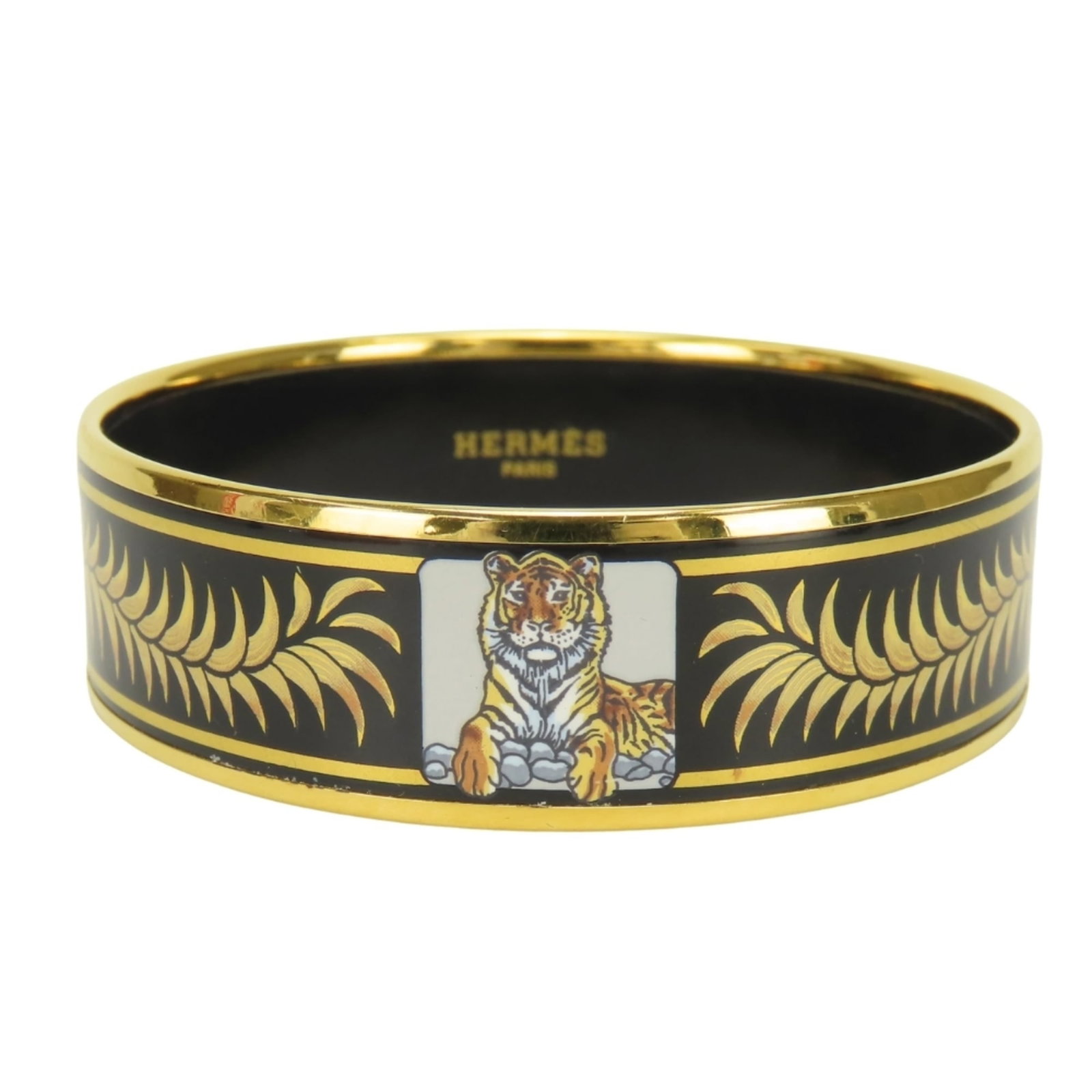 Hermes Bangle Cloisonn/ Enamel Metal: Hermes Bangle Cloisonn/ Enamel Metal Made from cloisonn/enamel and metal, this Hermes bangle boasts a sleek black finish and elegant gold accents. Its slender profile and refined design make it a styl