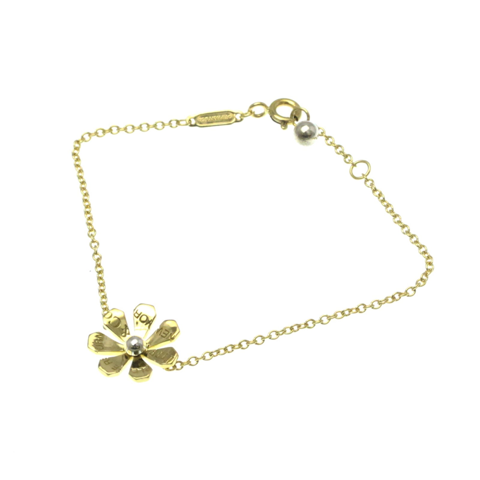 Tiffany Charm Bracelet Silver Yellow Gold (18K): Tiffany Charm Bracelet Silver Yellow Gold (18K) Silver and yellow gold (18K) come together in this elegant Tiffany charm bracelet, featuring a sleek design with no stone. Measuring 15cm / 5.9'' in