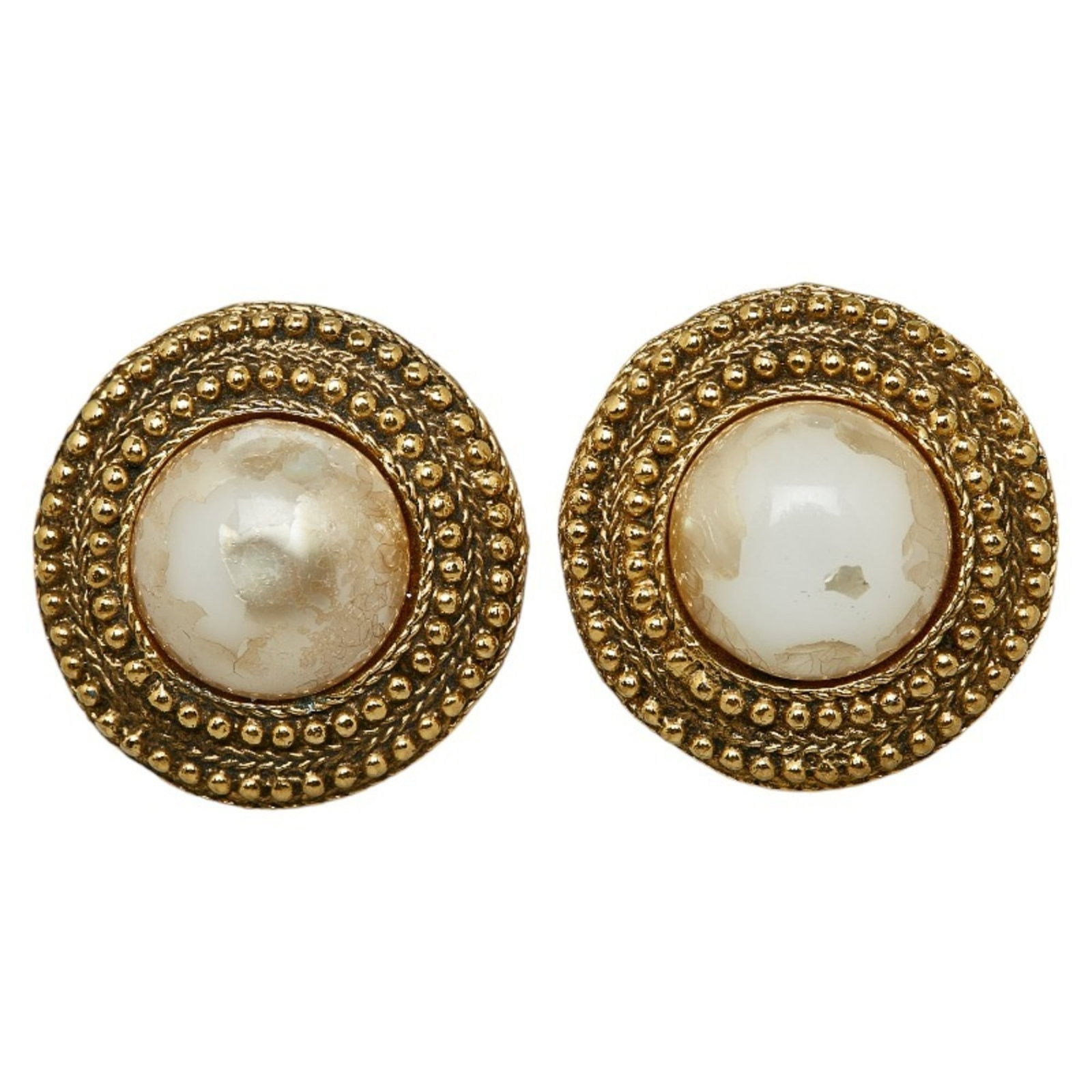 Chanel Clip Earrings Gold Plating: Chanel Clip Earrings Gold Plating Gold plating details add a touch of luxury to these Chanel clip earrings, featuring a classic design and a subtle pearl stone. The gold plating gives the earrings a