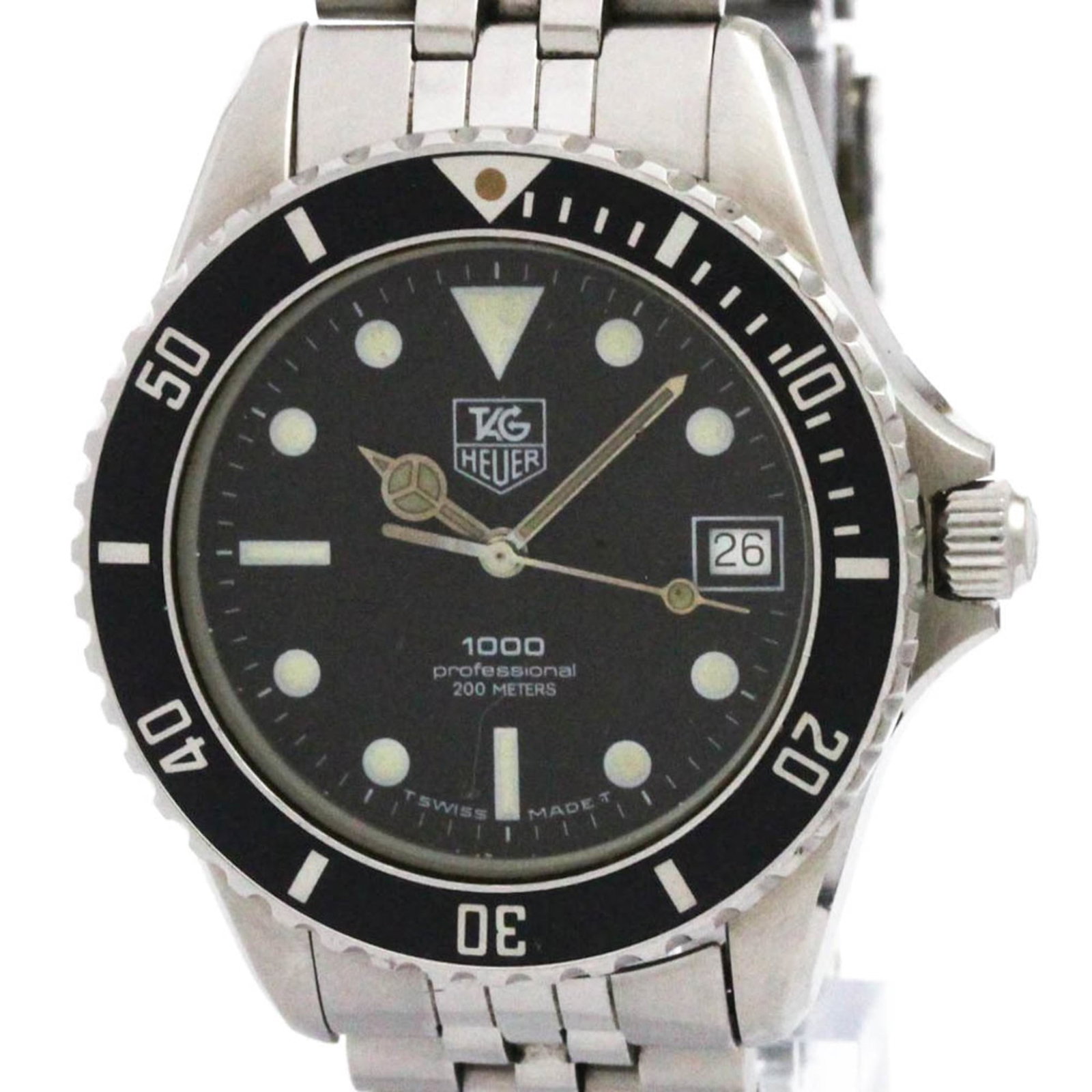 Wristwatch From Tag: Wristwatch From Tag Stainless steel case and band provide a rugged look, while the black dial adds a touch of sophistication. This Tag Heuer Professional quartz wristwatch features a date function