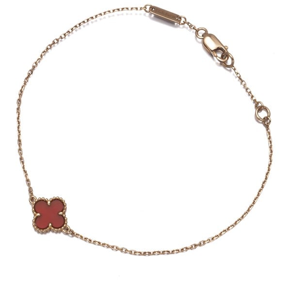 Carnelian Alhambra 18K 750 Rose Gold Van Cleef & Arpels Van: Carnelian Alhambra 18K 750 Rose Gold Van Cleef & Arpels Van 18k Rose Gold Carnelian Alhambra Bracelet by Van Cleef & Arpels, featuring a natural carnelian stone set in an elegant 750 rose gold
