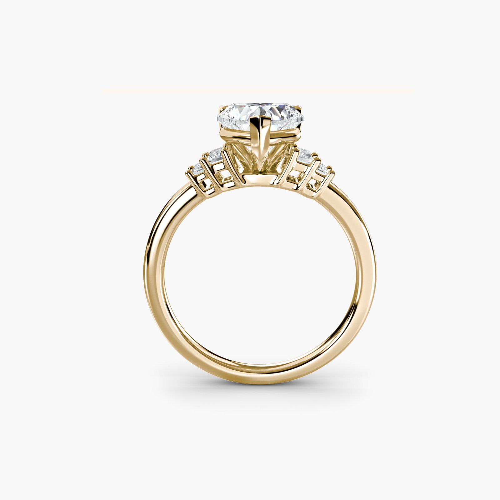 Solitaire Heart 18Kt Yellow Gold Ring Setting: Solitaire Heart 18Kt Yellow Gold Ring Setting 18Kt Yellow Gold Heart Ring Setting. This elegant solitaire heart ring setting boasts a slender profile and a delicate 2mm band width, accentuating the