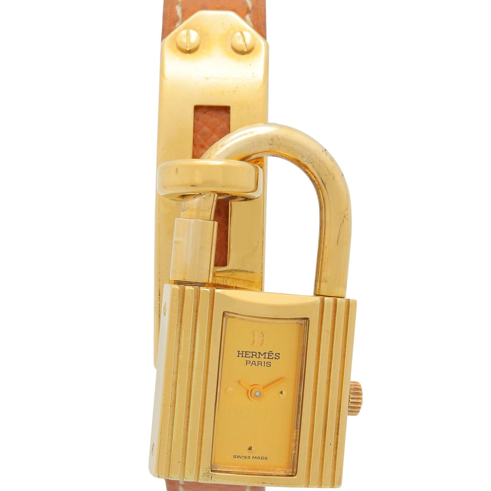 Hermes Wristwatch: Hermes Wristwatch Gold plated case and leather band make for a sophisticated look, while the quartz movement keeps time with precision. This 20mm gold plated wristwatch features a classic design that 