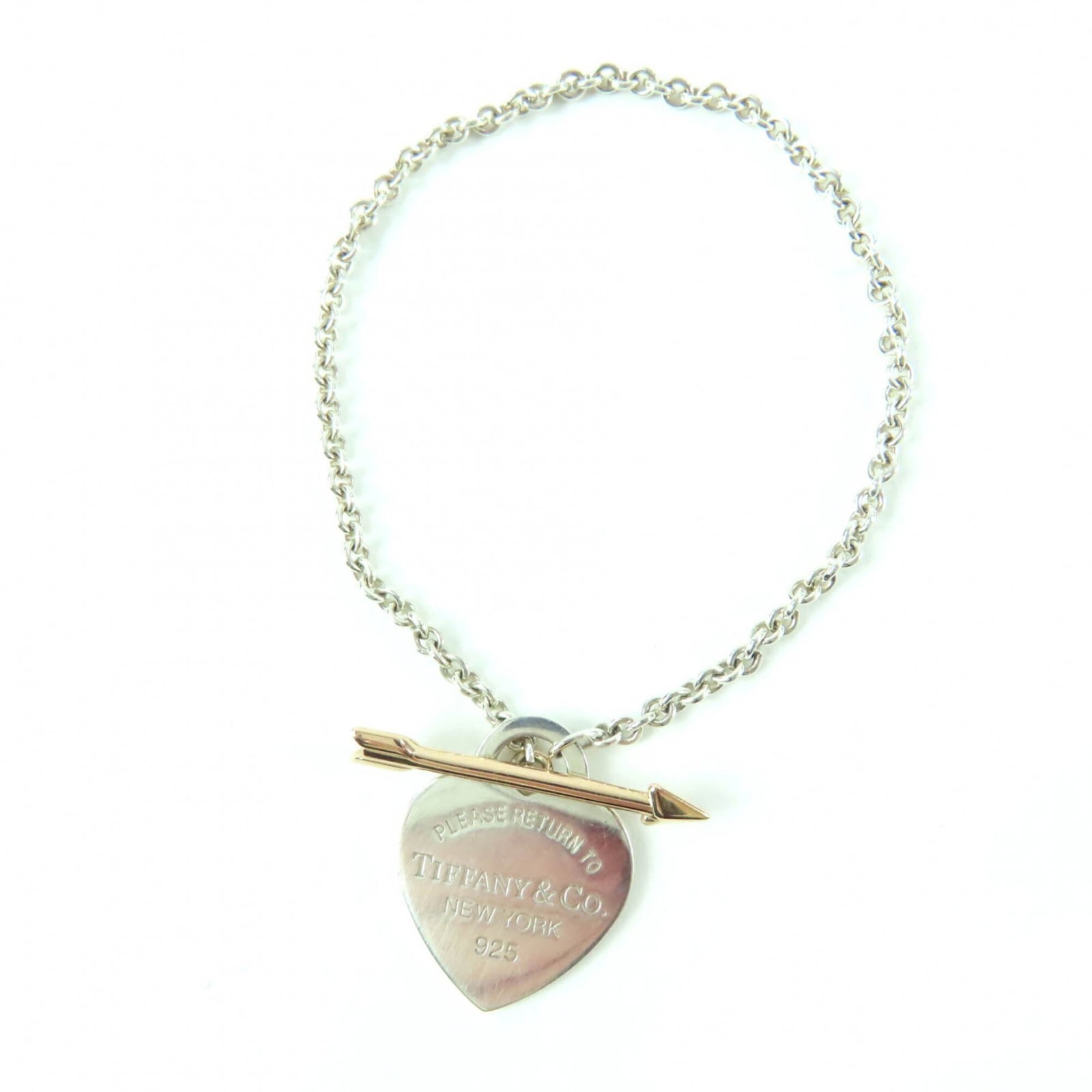Charm bracelet gold (18K) silver 925 Tiffany: Charm bracelet gold (18K) silver 925 Tiffany Gold (18K) and Silver 925 charm bracelet from Tiffany, crafted with 14cm length. This elegant piece combines gold and silver tones for a sophisticated