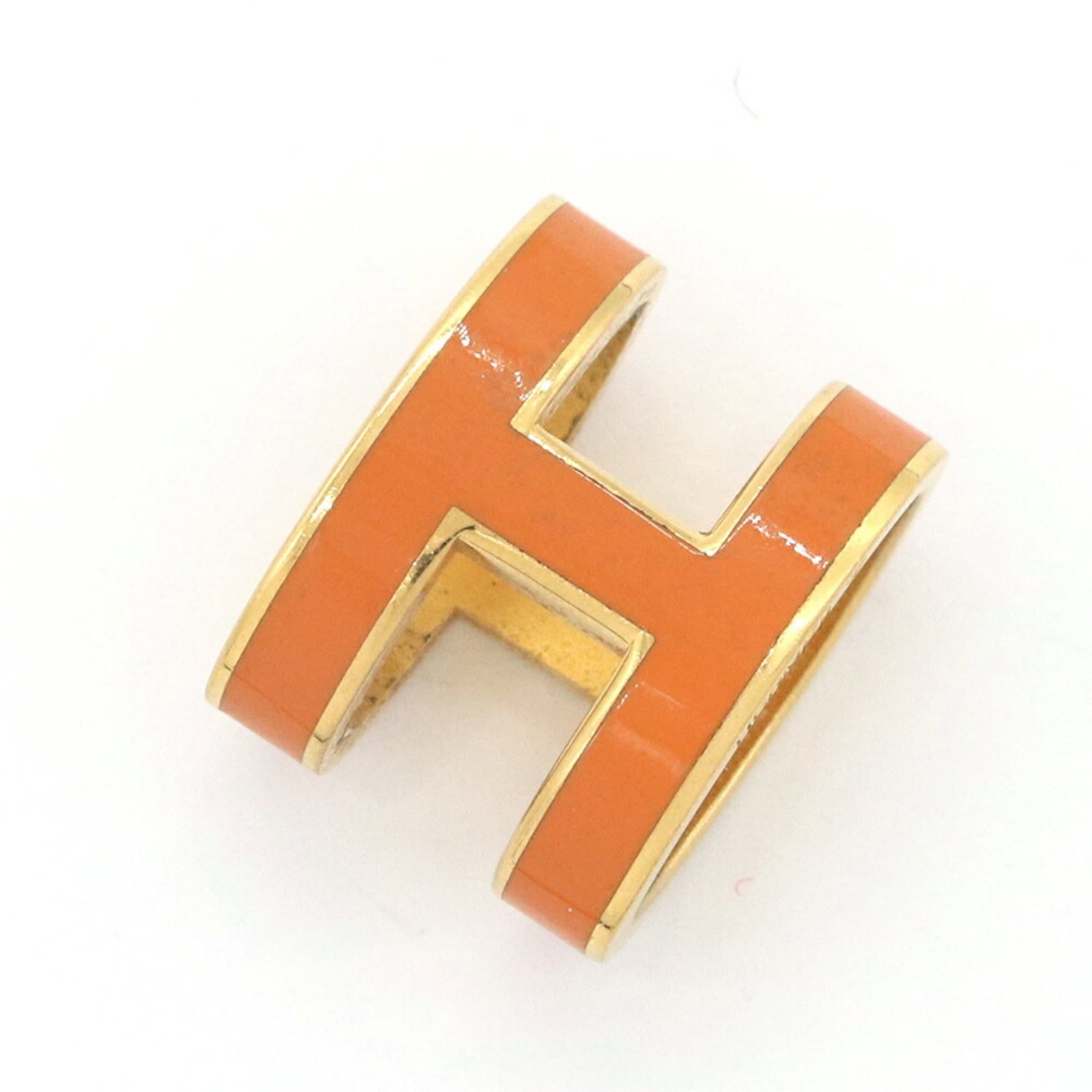 Hermes Pop H Pendant Top Orange Gold Metal Head Necklace For Women Hermes: Hermes Pop H Pendant Top Orange Gold Metal Head Necklace For Women Hermes The Hermes Pop H Pendant Top Orange Gold Metal Head Necklace for Women features a vibrant orange gold metal head pendant,