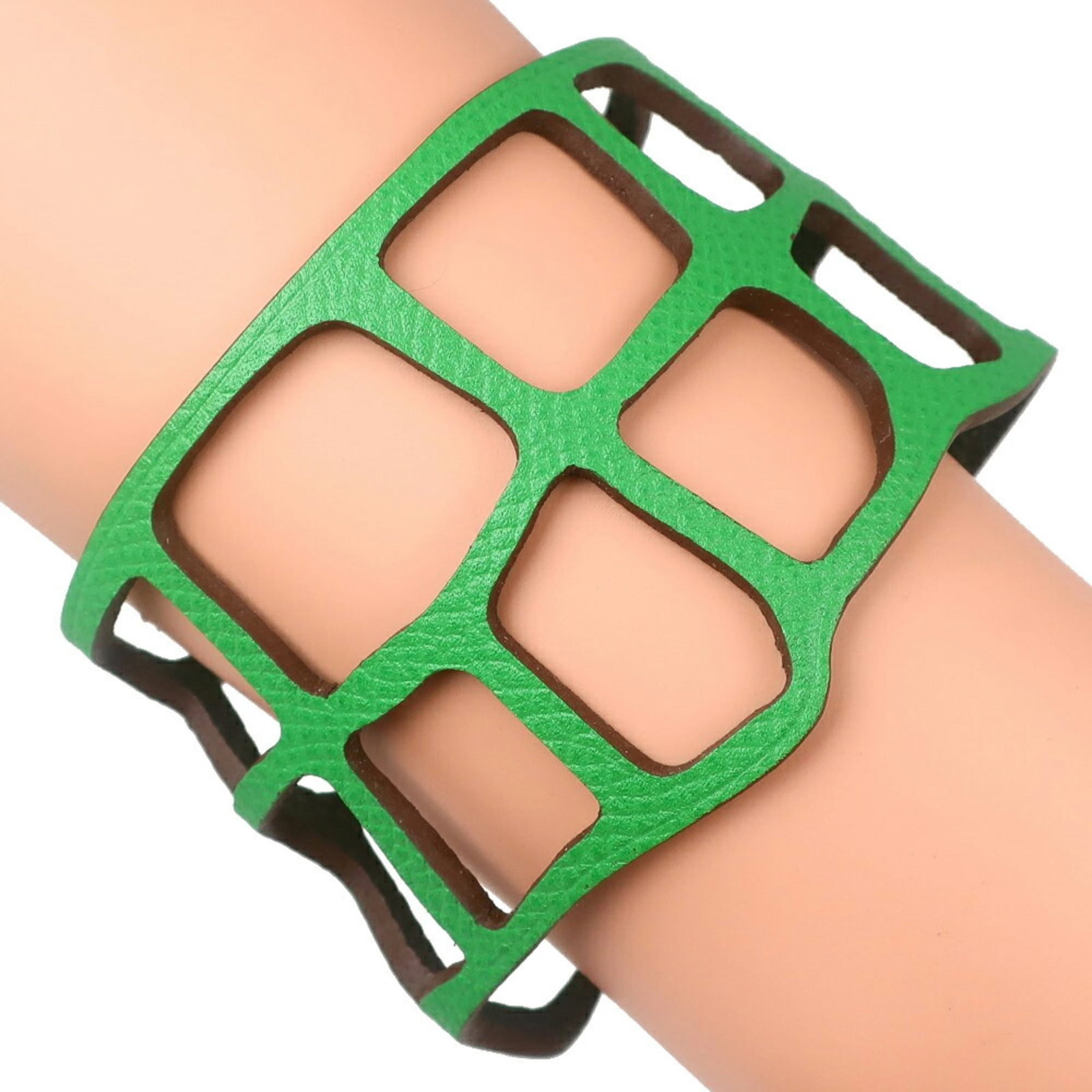 Togo Leather Hermes Bangle: Togo Leather Hermes Bangle Togo leather Hermes bangle with a vibrant green hue, measuring 18cm in length, comes with a dust bag for storage. This stylish accessory features the iconic brand of Hermes,