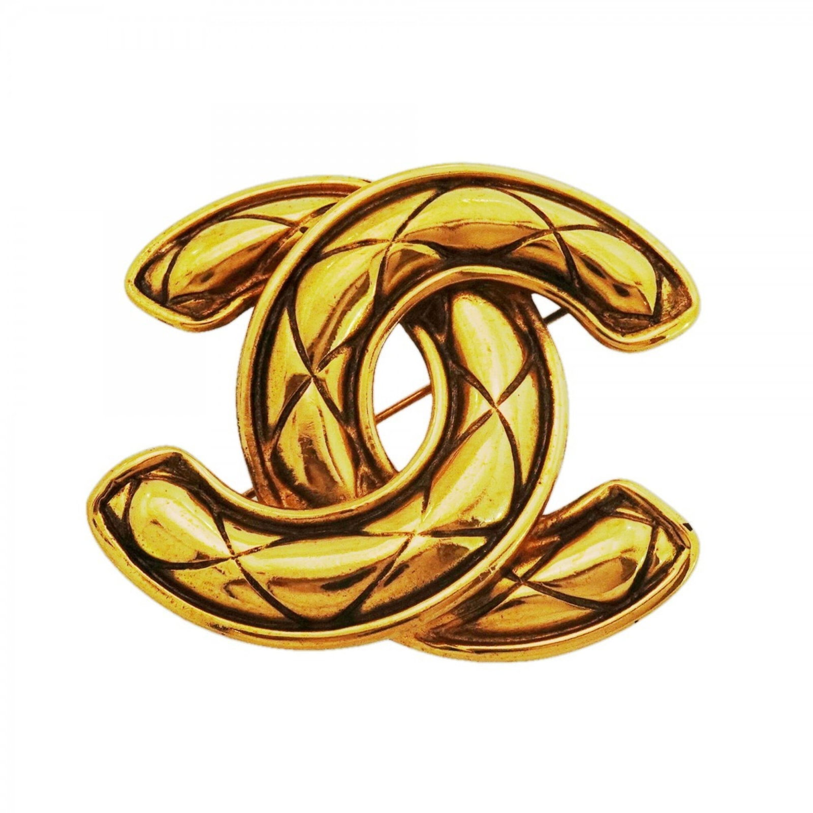 Chanel Brooch Gold Plating: Chanel Brooch Gold Plating Gold plating adds a touch of luxury to this Chanel brooch, which measures 4.89cm x 5.71cm and features gold plating material. The signature is present on the piece, noting