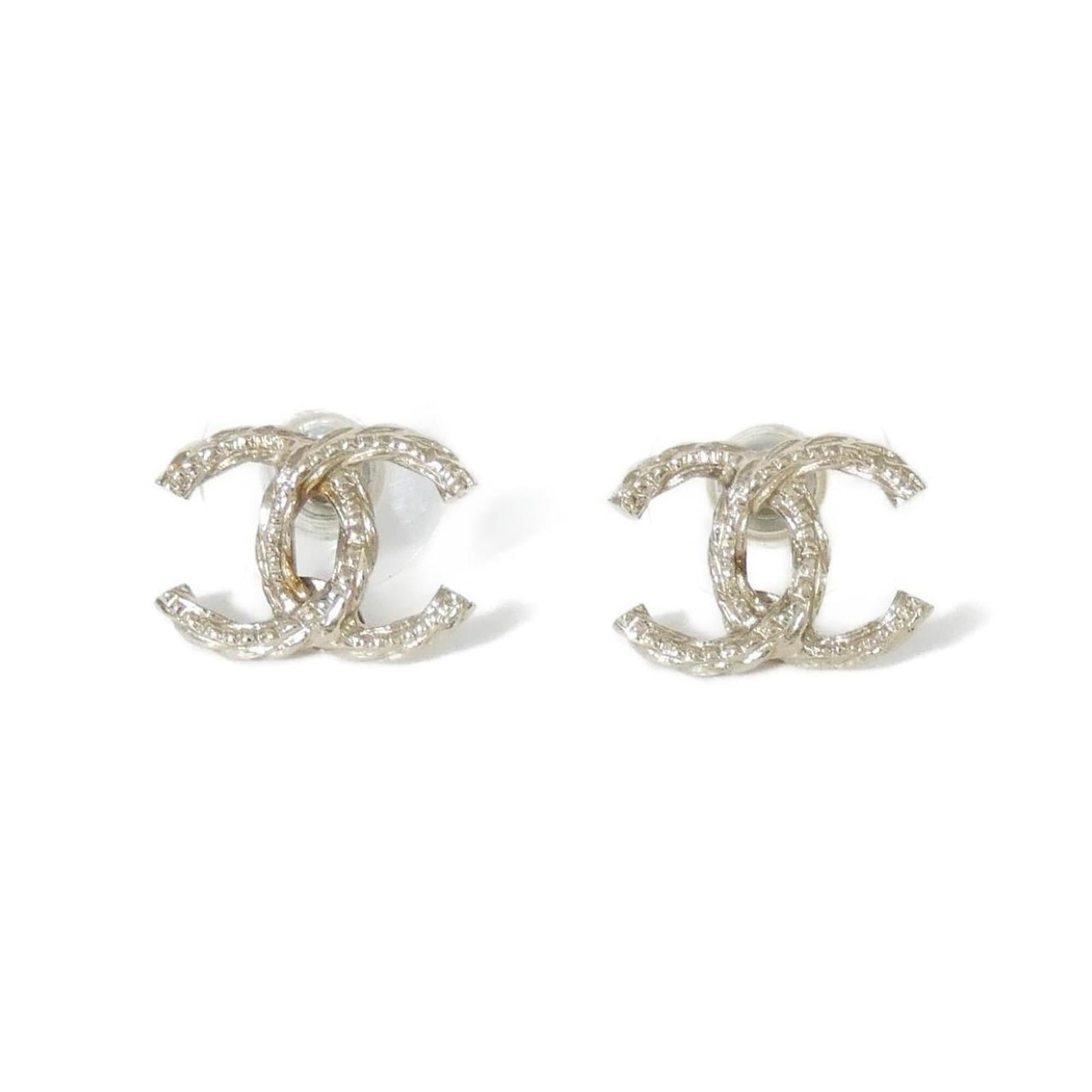 Chanel Stud Earrings: Chanel Stud Earrings Gold stud earrings from Chanel, measuring 10.00mm x 15.00mm in size. These earring details are consistent with the item's MPN (Model Number) 85894. The earrings' gold color and