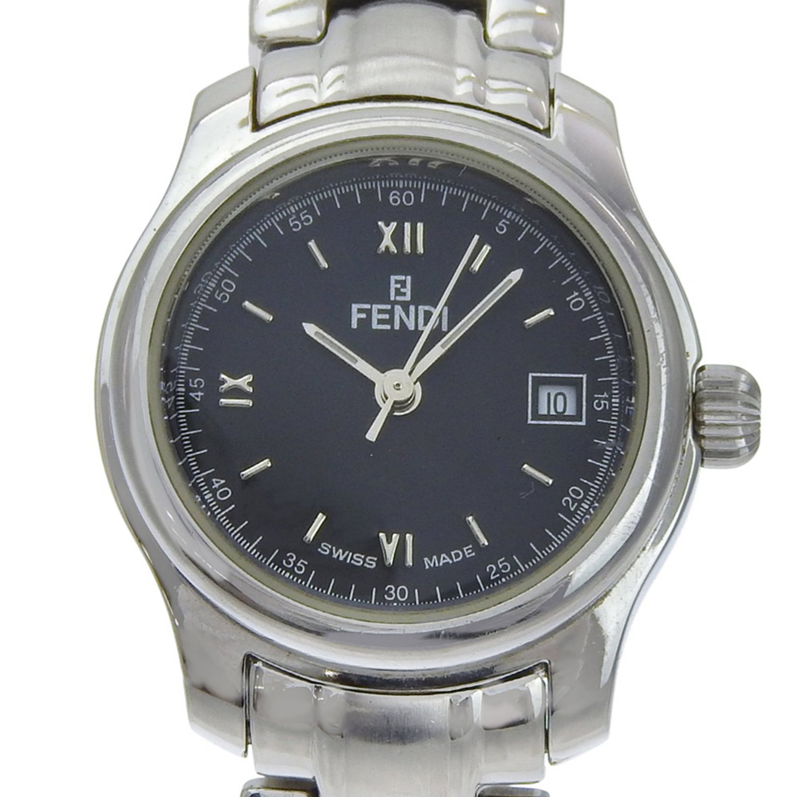 Fendi Wristwatch: Fendi Wristwatch Stainless steel case and band provide a sleek, modern look for the Fendi wristwatch. The black dial stands out against the neutral background, while quartz movement ensures reliable
