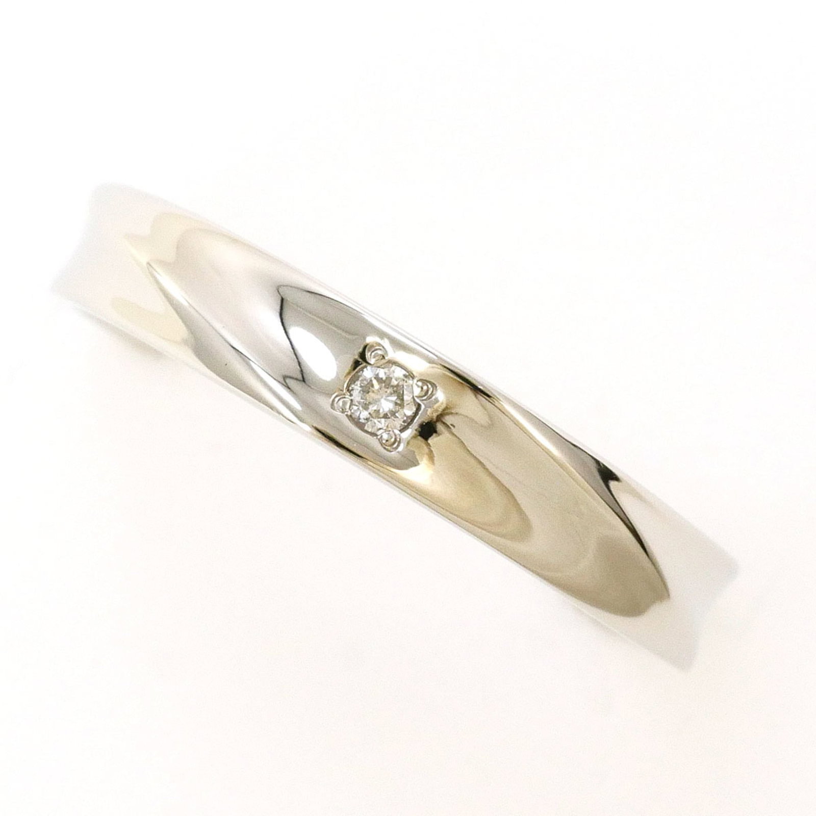 Ring Band Platinum Unbranded 900: Ring Band Platinum Unbranded 900 Platinum ring band with a diamond stone, weighing 0.02 carats, set in a platinum metal construction featuring a US size 5.5 and Japanese size 10 fit. The band