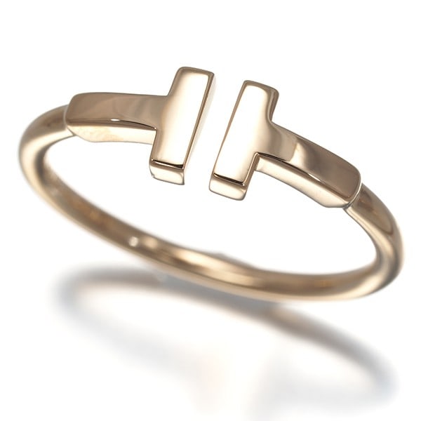 Tiffany&Co. Ring Tiffany T Wire Us6.5-6.75 18K 750 Rose Gold: Tiffany&Co. Ring Tiffany T Wire Us6.5-6.75 18K 750 Rose Gold Tiffany&Co. Ring Tiffany T Wire in Rose Gold, crafted from 18K / 750 material, boasts a sleek design with a width of 5.8mm and a base of