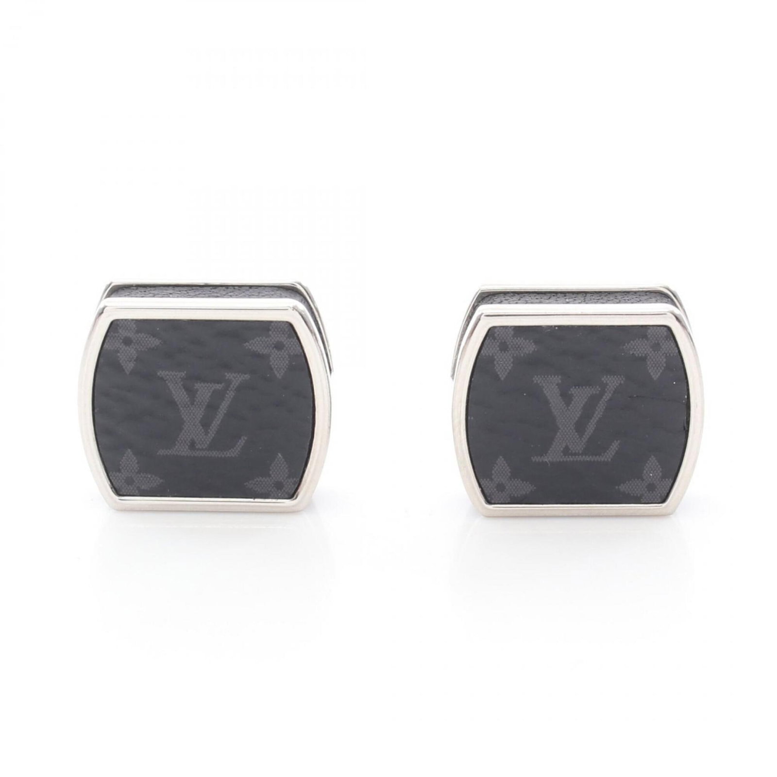 Metal Monogram Eclipse of Cufflinks by Louis Vuitton: Metal Monogram Eclipse of Cufflinks by Louis Vuitton Metal Monogram Eclipse Cufflinks by Louis Vuitton feature the iconic Monogram Eclipse pattern in black and silver, adding a touch of luxury to any
