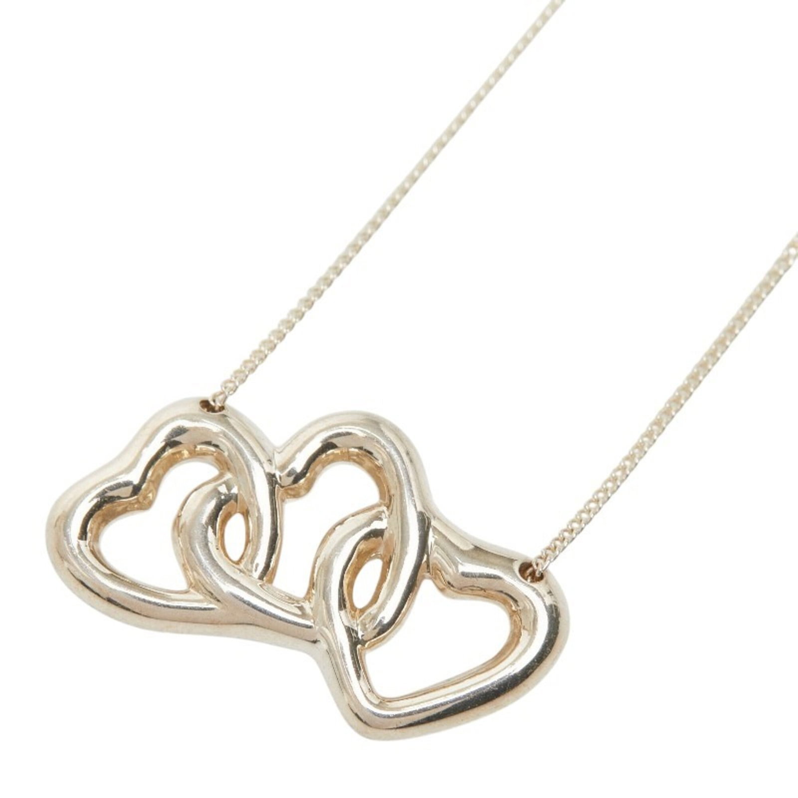 Tiffany & Co. Triple Open Heart Necklace Sv925 Silver Women'S.: Tiffany & Co. Triple Open Heart Necklace Sv925 Silver Women'S. Tiffany & Co. Triple Open Heart Necklace in sterling silver (925) features a striking design with an open heart motif, showcasing the