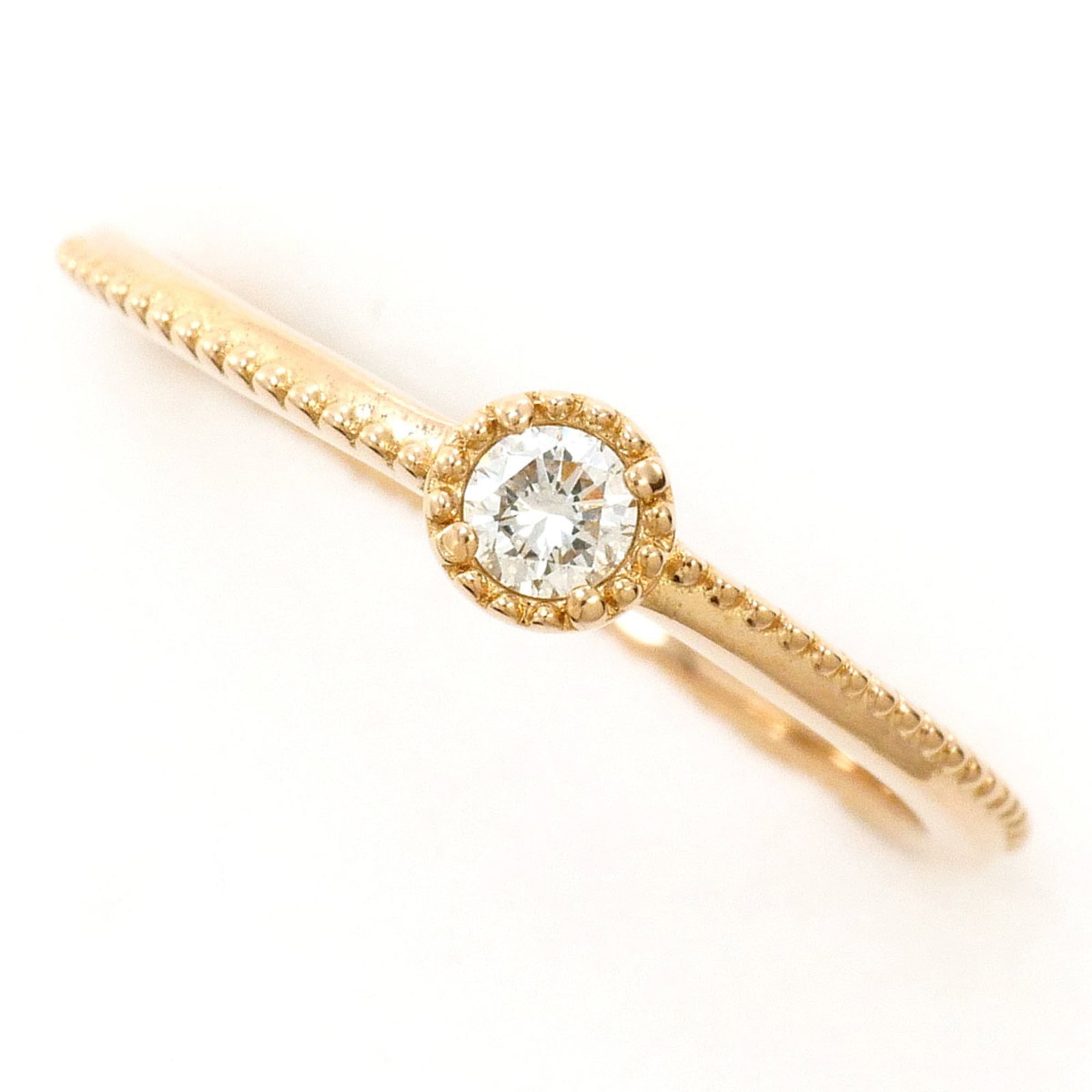 Pink Gold 18K Unbranded Band Ring: Pink Gold 18K Unbranded Band Ring Pink gold 18K band ring features a diamond stone weighing 0.08 carats, set in a 4mm wide pink gold (18K) band with a US size 8 and JP size 4.5 fit. The ring weighs