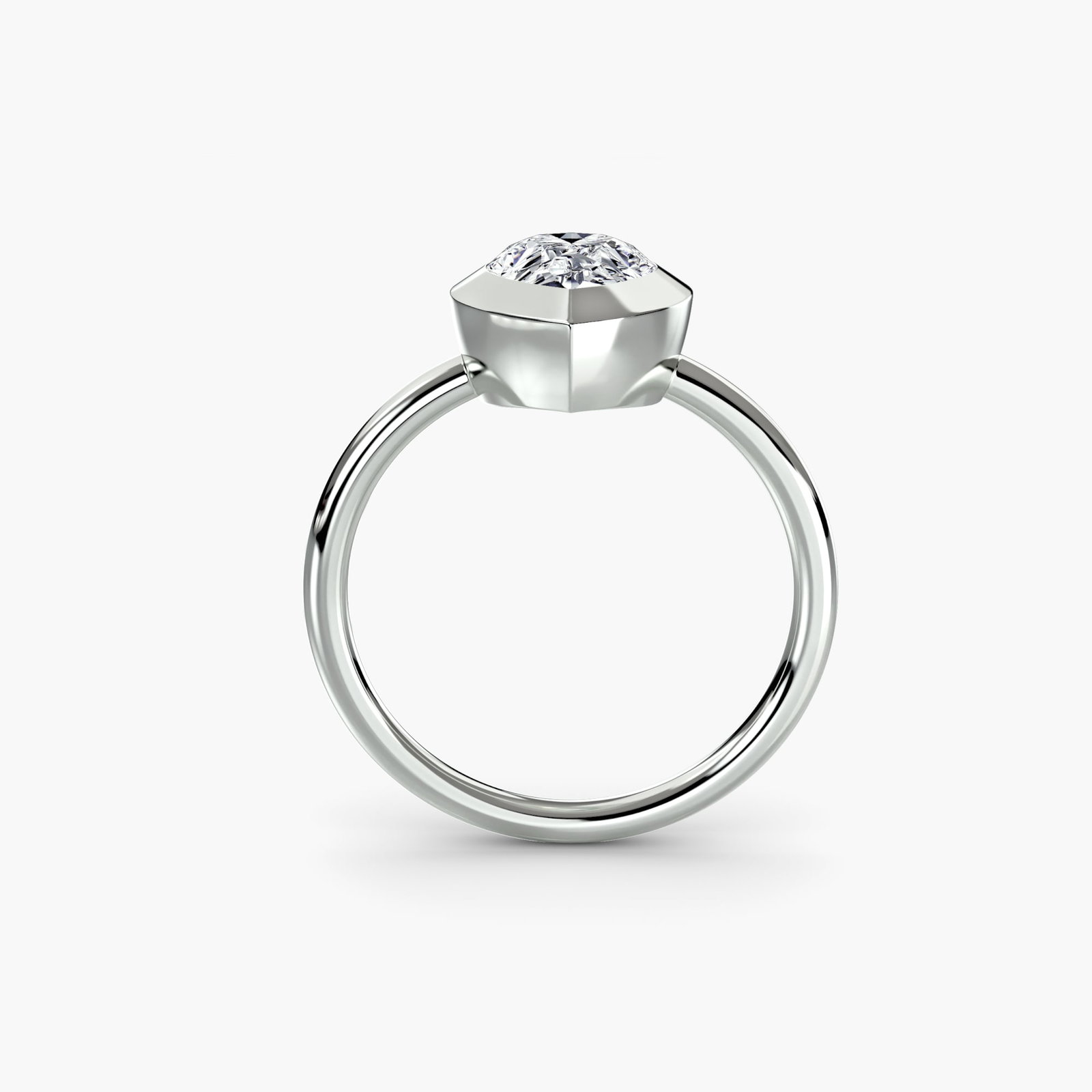 Solitaire Pear 18Kt White Gold Ring Setting: Solitaire Pear 18Kt White Gold Ring Setting 18Kt White Gold Pear Ring Setting. This elegant ring setting features a slender pear shape, ideal for showcasing a single stone. With its sleek design and p