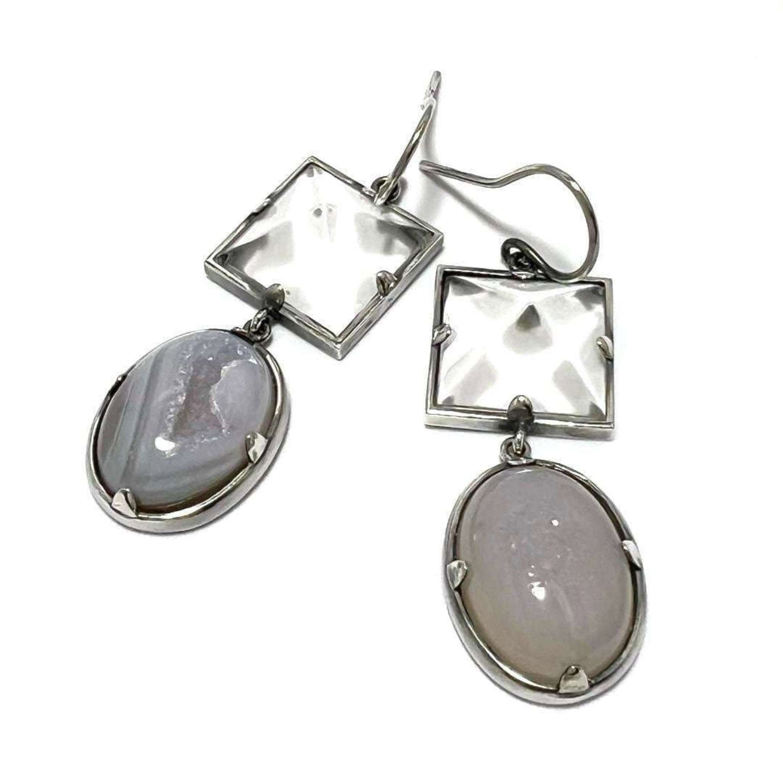 Hoop earrings silver 925 by Bottega Veneta: Hoop earrings silver 925 by Bottega Veneta Silver 925 hoop earrings from Bottega Veneta feature a chalcedony stone, showcasing the luxury and sophistication of this iconic Italian brand. The sleek