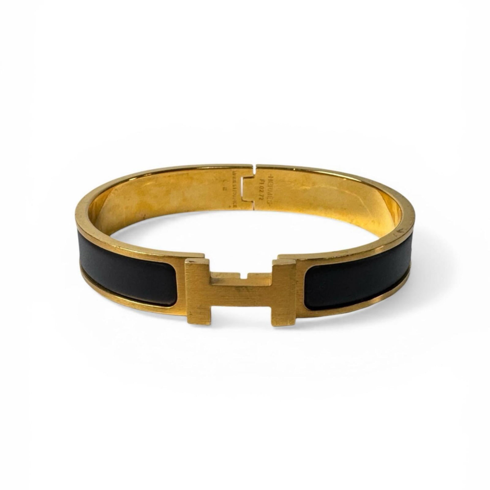Hermes Charm Bracelet Gold Plating: Hermes Charm Bracelet Gold Plating Gold plating adds a touch of luxury to this Hermes charm bracelet, available in black and gold. Measuring 17.5cm in length, it's designed for everyday wear. The gold