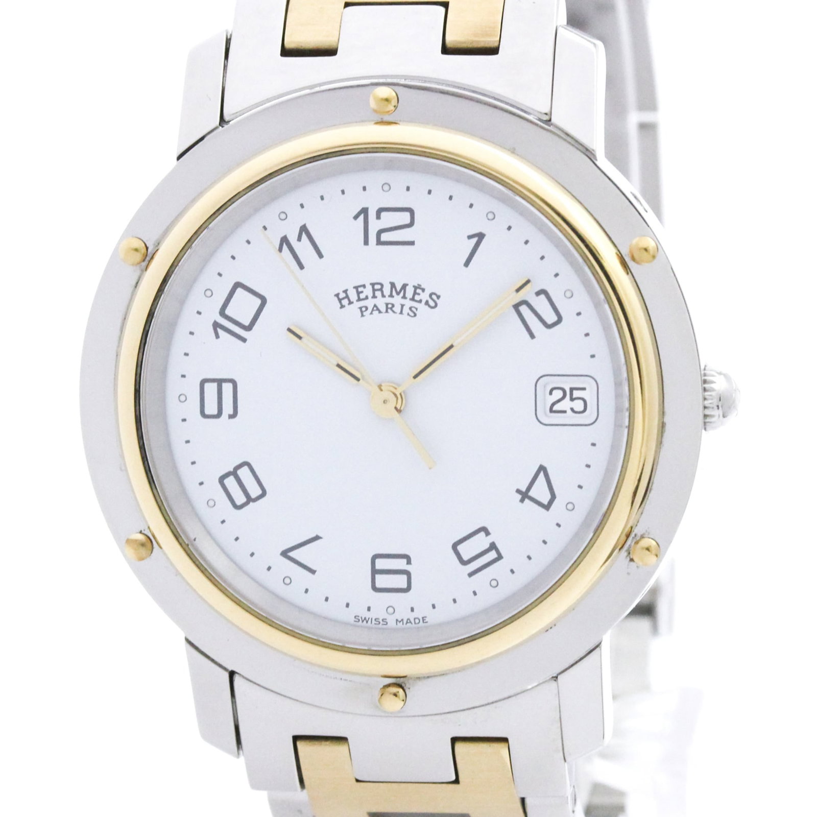 Hermes Wristwatch: Hermes Wristwatch The Hermes Clipper Wristwatch boasts a sleek, gold-plated case and stainless steel band, making it a stylish addition to any formal outfit. Its white quartz movement ensures