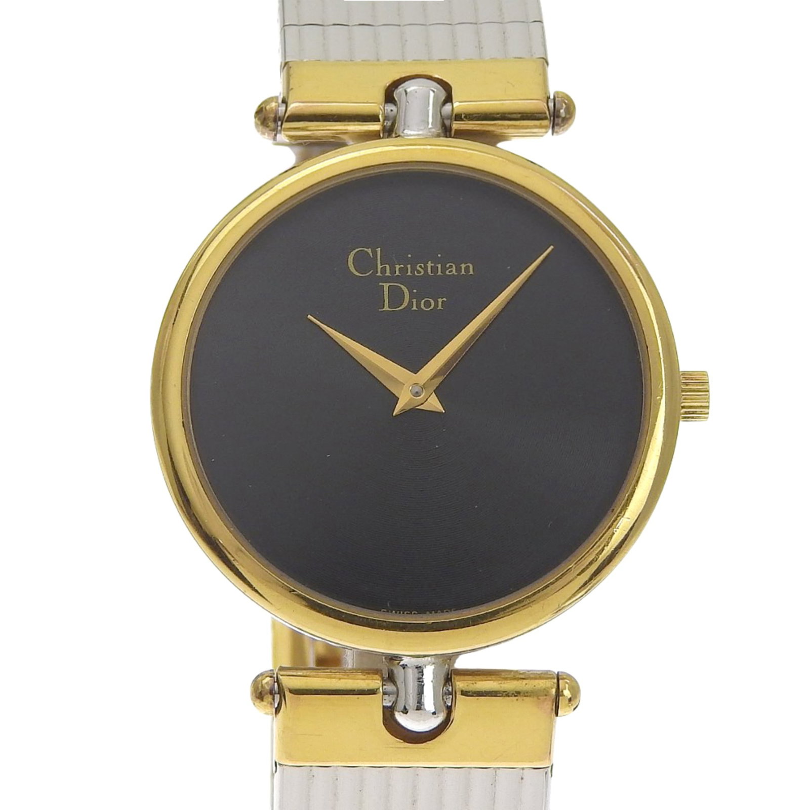 Christian Dior Wristwatch: Christian Dior Wristwatch Christian Dior's elegant wristwatch boasts a sleek black dial and a sophisticated gold-plated, stainless steel band. The quartz movement powers this stylish timepiece, which