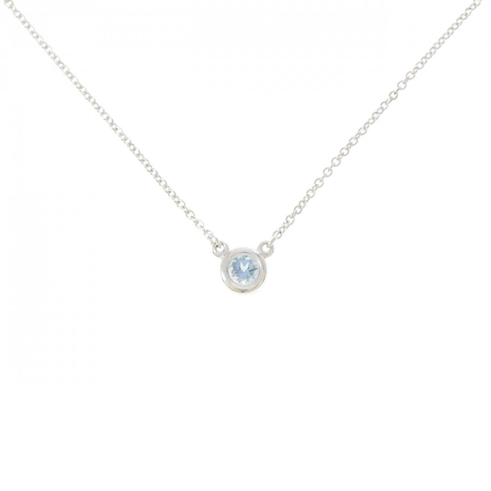 Co Tiffany & Necklace By Yard The: Co Tiffany & Necklace By Yard The Silver Tiffany & Co. Necklace with Aquamarine Pendant features a sleek silver chain and a beautiful aquamarine stone, measuring 5.9mm x 5.9mm. The necklace has a