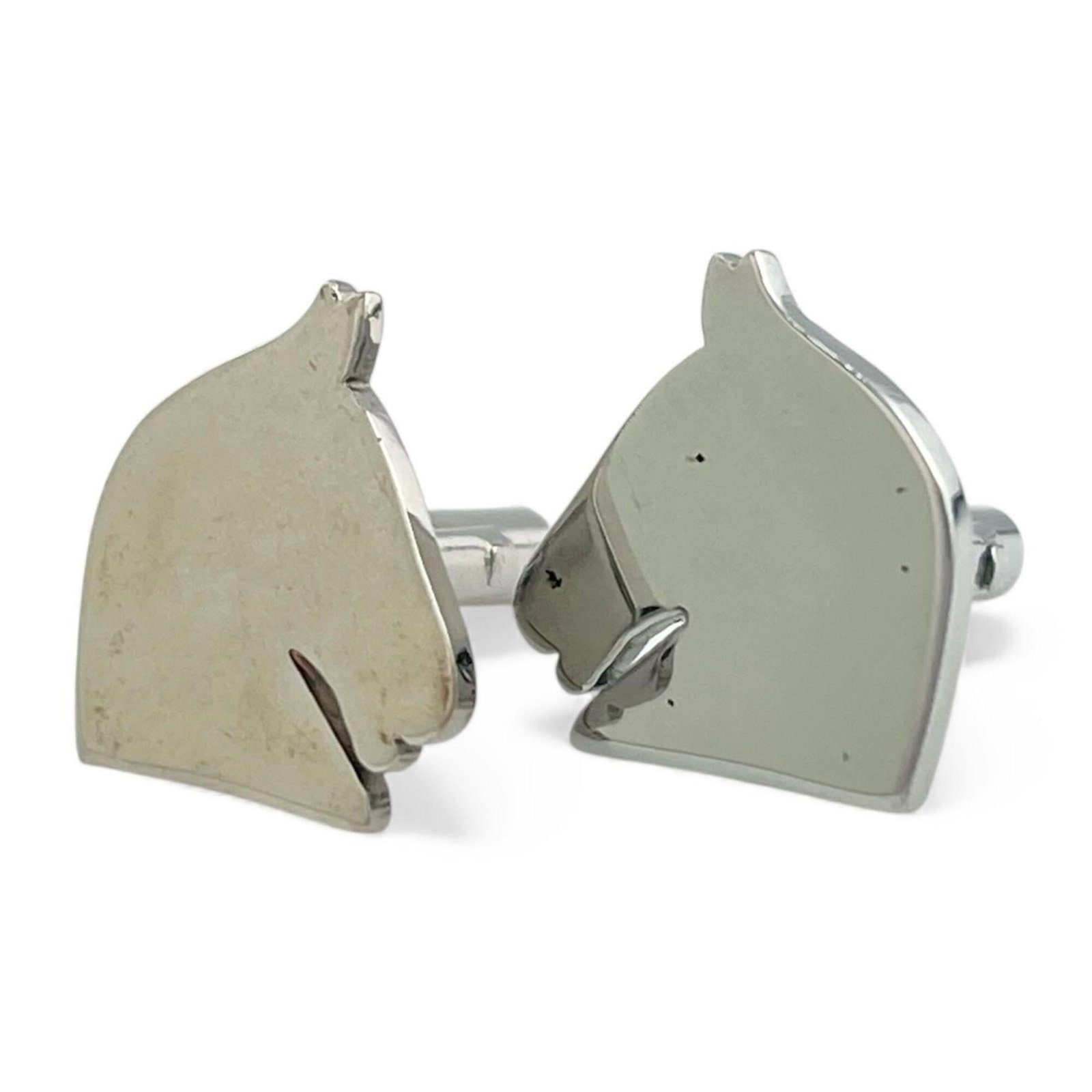 Hermes Stud/ Button: Hermes Stud/ Button Silver Hermes Stud/Button with precise diameter markings. This small, detailed piece showcases the brand's attention to precision and craftsmanship. Its understated elegance makes 