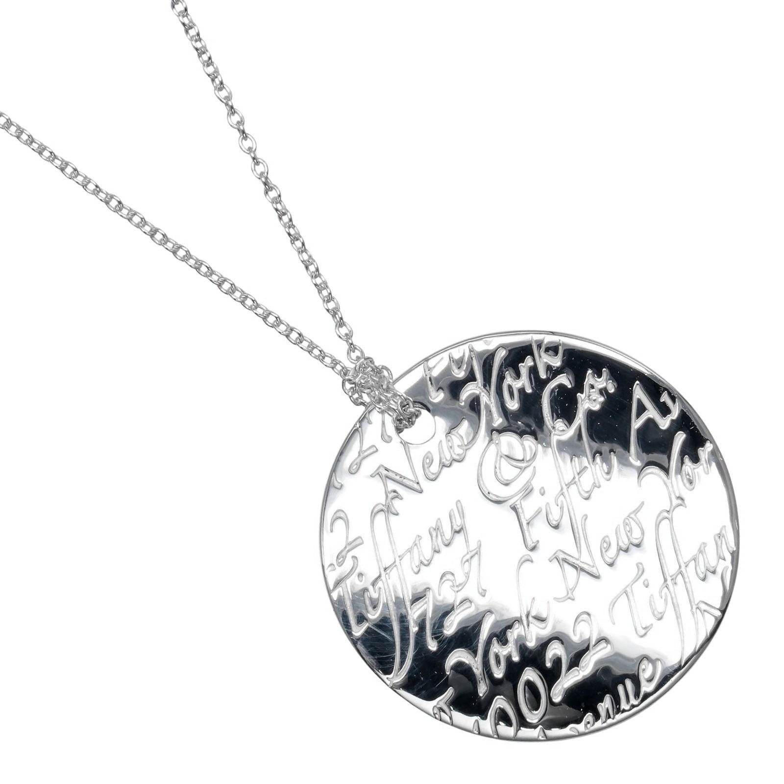 Tiffany & Co. Notes Round Tag Necklace 925 Silver Approx. 9.0G: Tiffany & Co. Notes Round Tag Necklace 925 Silver Approx. 9.0G Tiffany & Co. Notes Round Tag Necklace in sterling silver, featuring a round tag pendant with dimensions 23.8mm x 23.6mm. This necklace