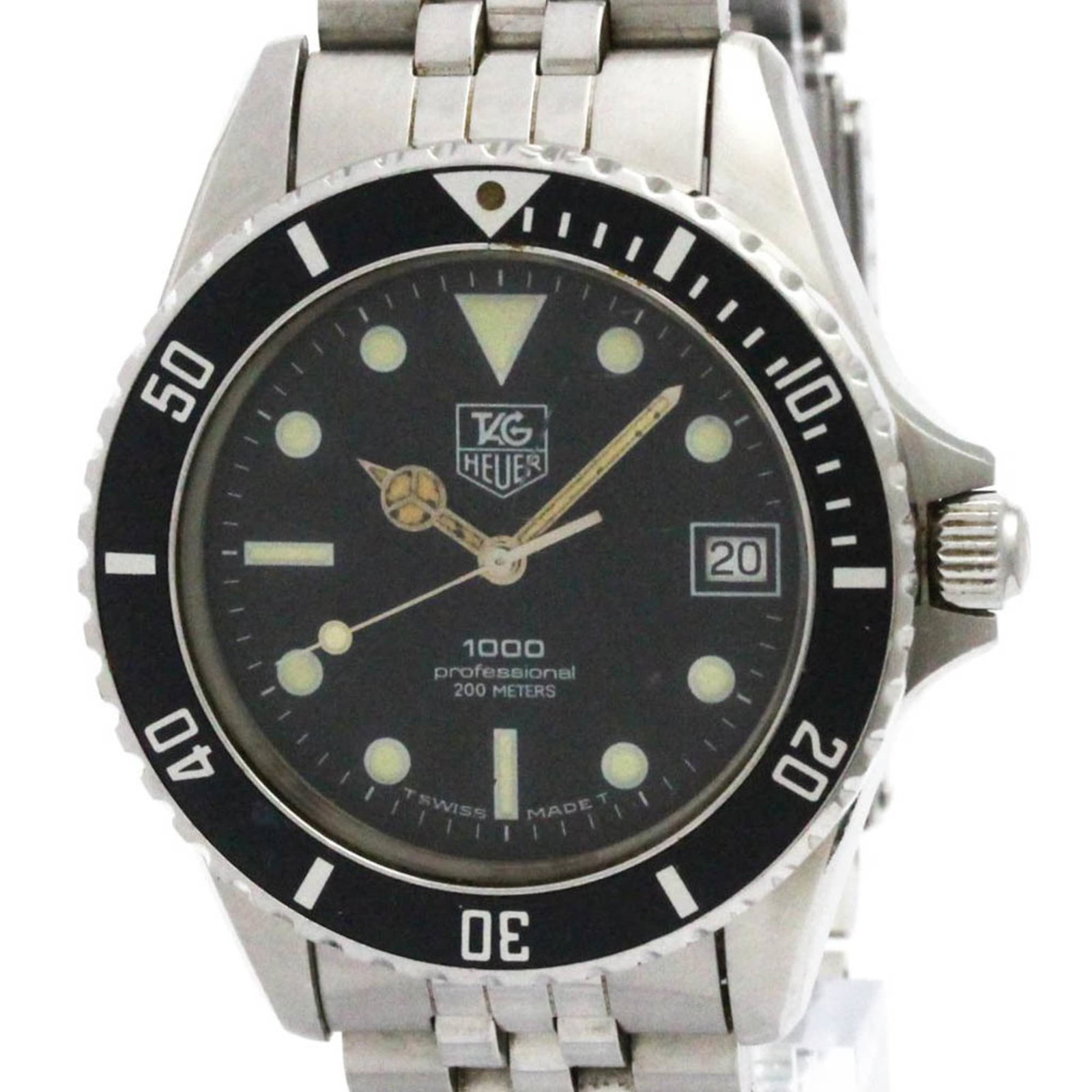 Wristwatch From Tag: Wristwatch From Tag Stainless steel case and band provide a rugged look, while the black dial adds a touch of sophistication. This Tag Heuer Professional quartz wristwatch features a date function