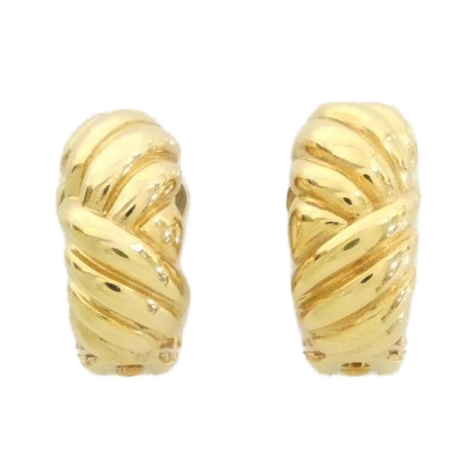 Clip earrings by Christian Dior: Clip earrings by Christian Dior Clip earrings by Christian Dior, featuring a sleek gold design with precise measurements of 18.00mm x 5.00mm / 0.71'' x 0.20''. These elegant clip earrings showcase