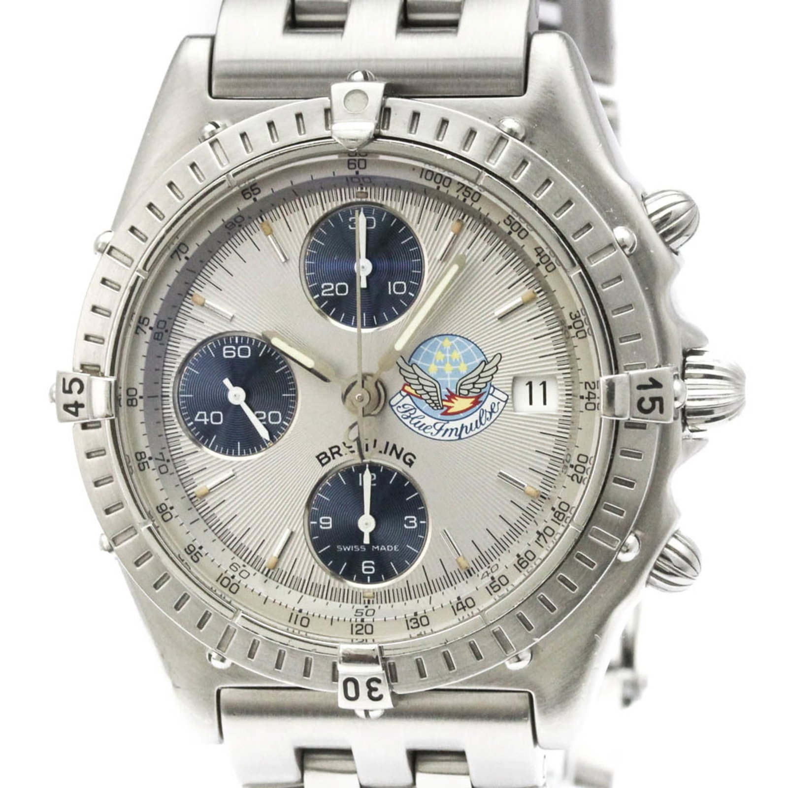 Breitling Wristwatch: Breitling Wristwatch Stainless steel case and band, silver dial, and automatic self-winding movement make this Breitling Chronomat wristwatch a versatile timepiece. The chronograph function adds an ex
