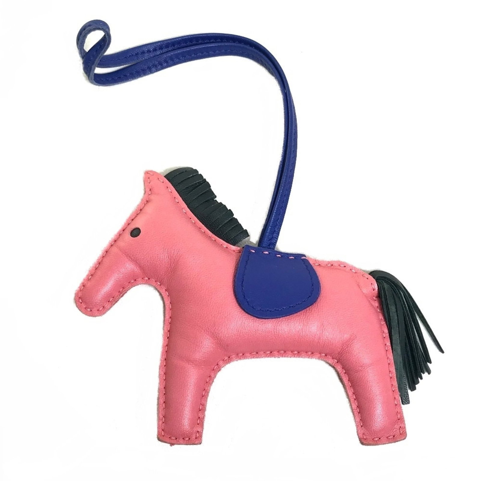 Hermes agneau handbag charm Milo: Hermes agneau handbag charm Milo Agneau Milo handbag charm from Hermes features a striking blue, gray, and pink color combination. Made from Agneau Milo material, this charm boasts a unique size and