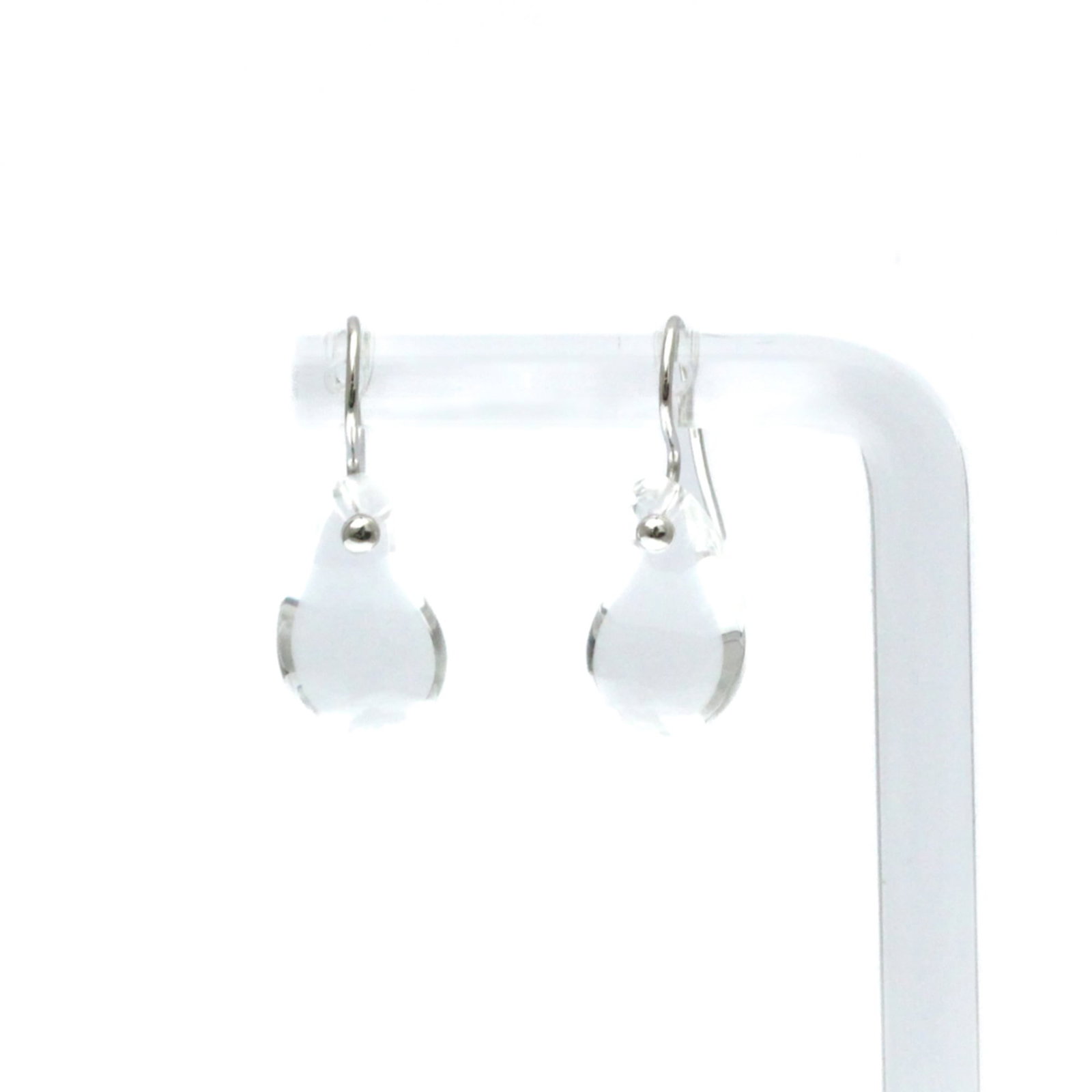 Tiffany Drop Earrings White Gold (18K): Tiffany Drop Earrings White Gold (18K) Tiffany's teardrop crystal drop earrings shine in white gold (18K), their elegant design crafted from high-quality silver-toned metal. The 16.30mm x 10.00mm crys