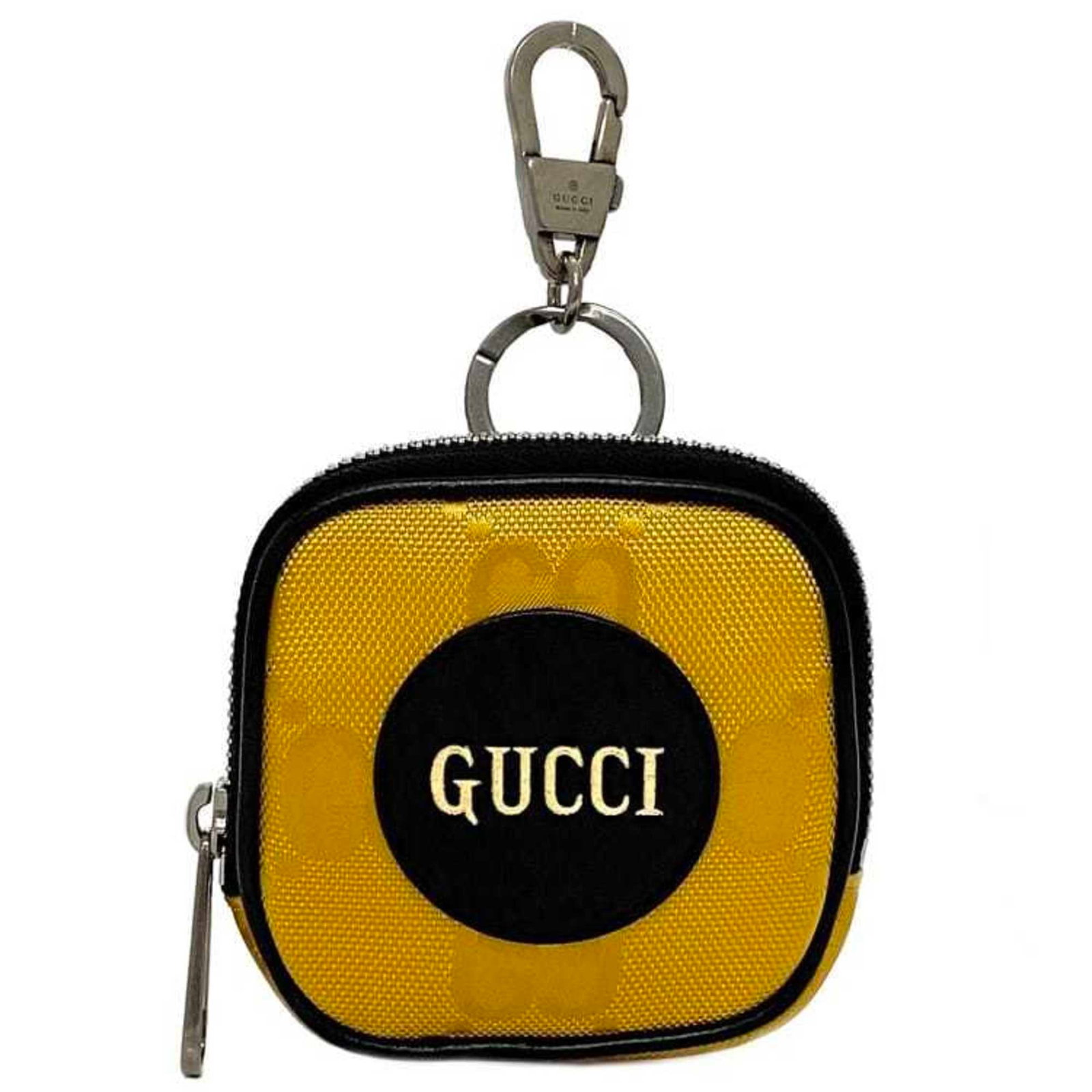 Nylon leather handbag charm Gucci: Nylon leather handbag charm Gucci Gucci handbag charm made from high-quality leather and nylon, featuring a sleek black and yellow design. Measuring 105mm x 105mm x 28mm, this compact accessory comes 