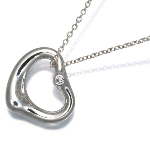 Diamond Necklace Open Silver 925 By Tiffany & Co: Diamond Necklace Open Silver 925 By Tiffany & Co Sterling Silver 925 by Tiffany & Co, the iconic luxury brand, presents an exquisite Open Heart necklace featuring a natural diamond pendant. The