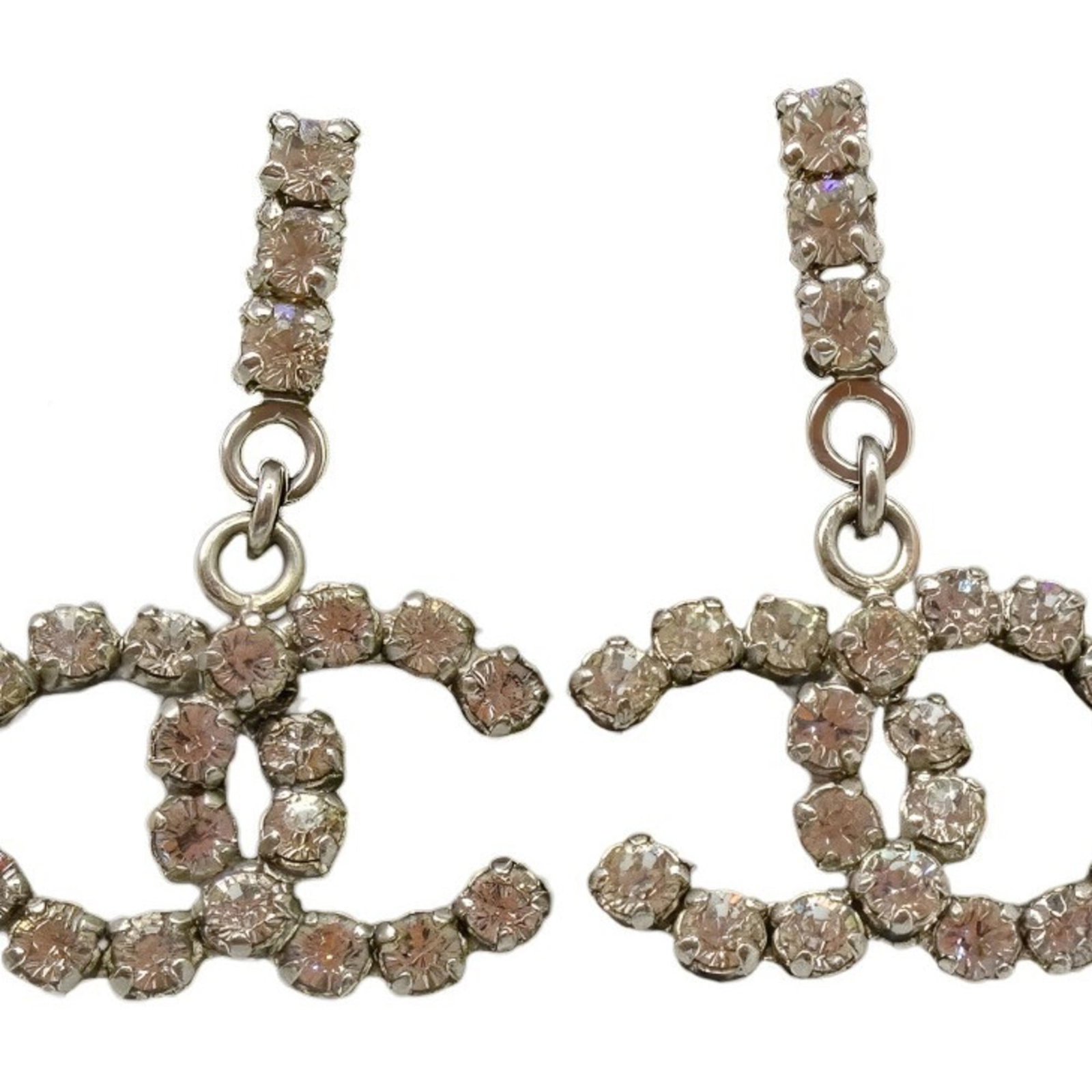 Chanel Stud Earrings Gold Plating Rhinestone: Chanel Stud Earrings Gold Plating Rhinestone Stud earrings in gold plating with rhinestone details, adding a touch of luxury to any outfit. The silver-toned Chanel logo adds a sophisticated finish to